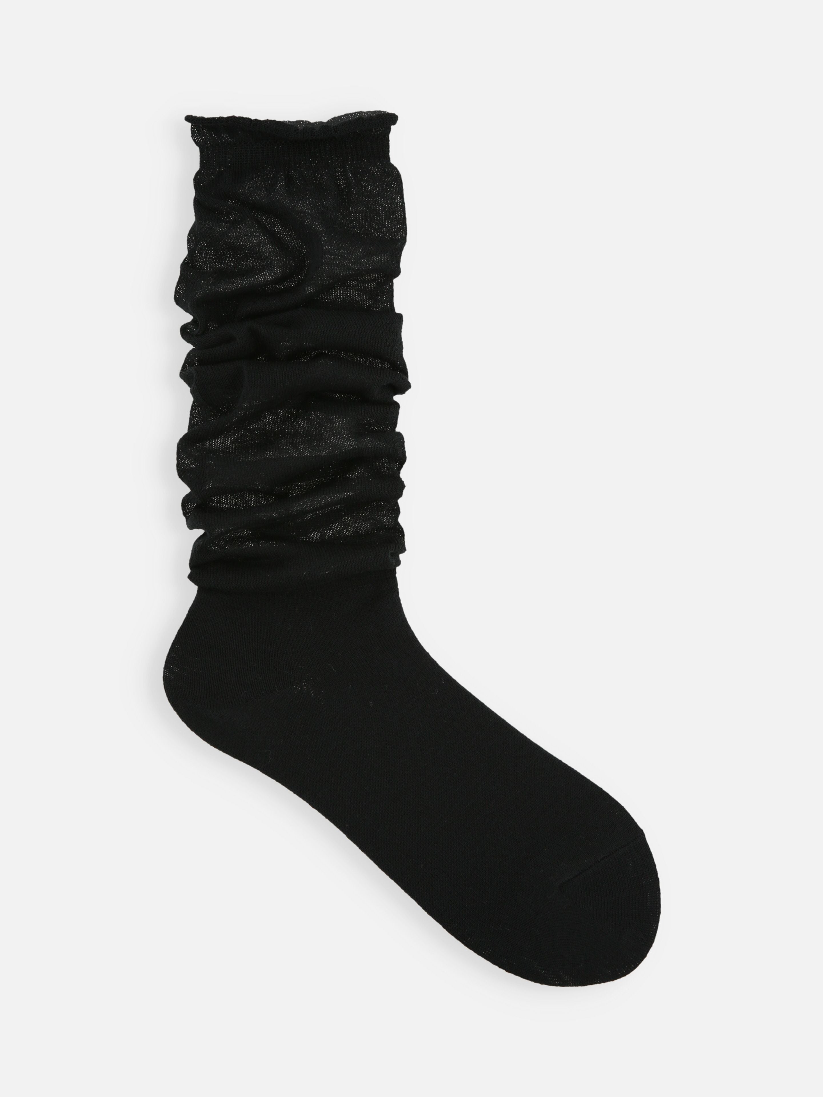 Tabio Loose-Style Light Knee High Socks, black, front view; delicate, sheer texture ideal for sneakers or loafers.