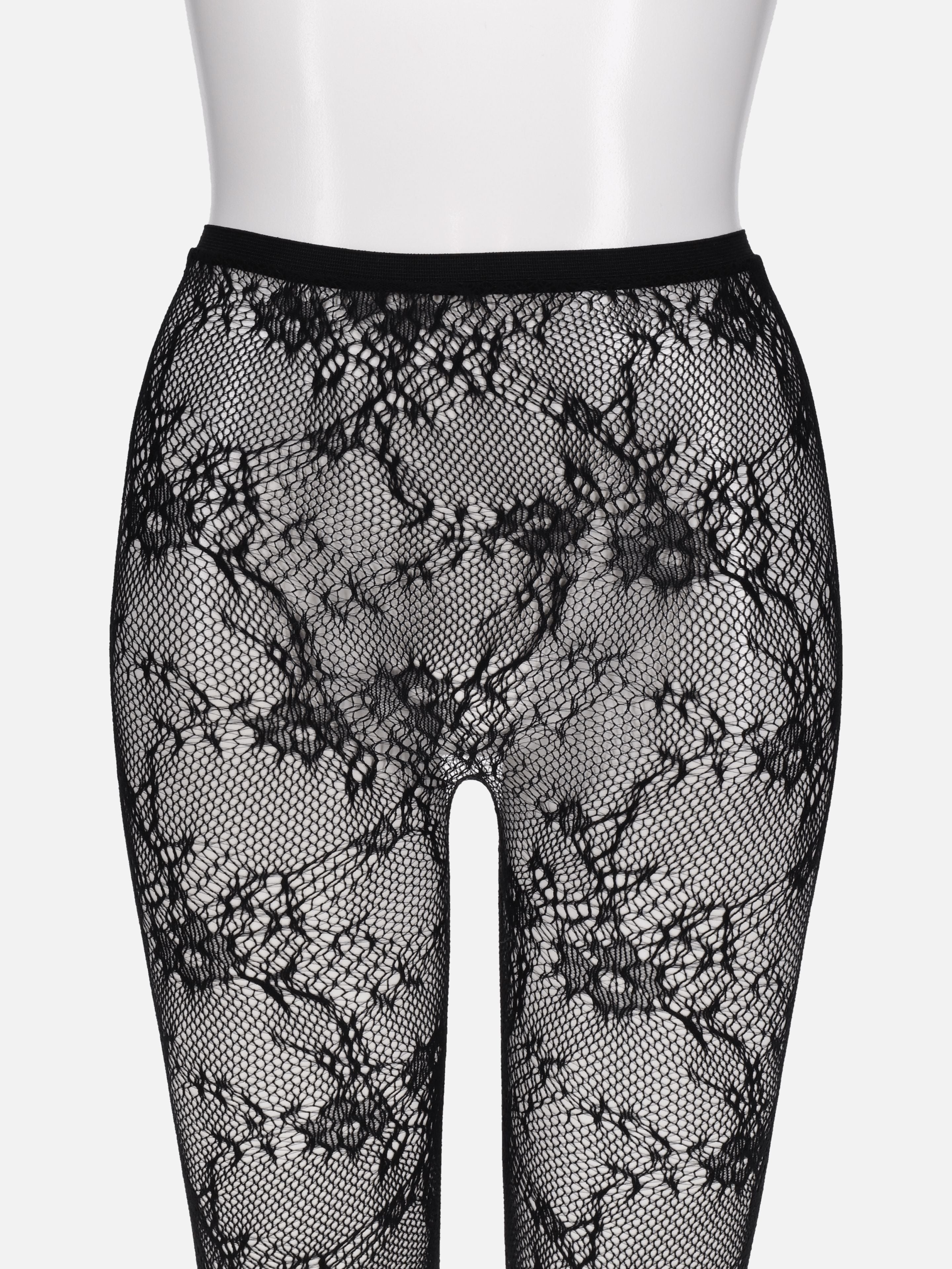 Tabio Raschel Lace Tights in black/ecru, showcasing a close-up of the intricate floral lace pattern and soft texture.