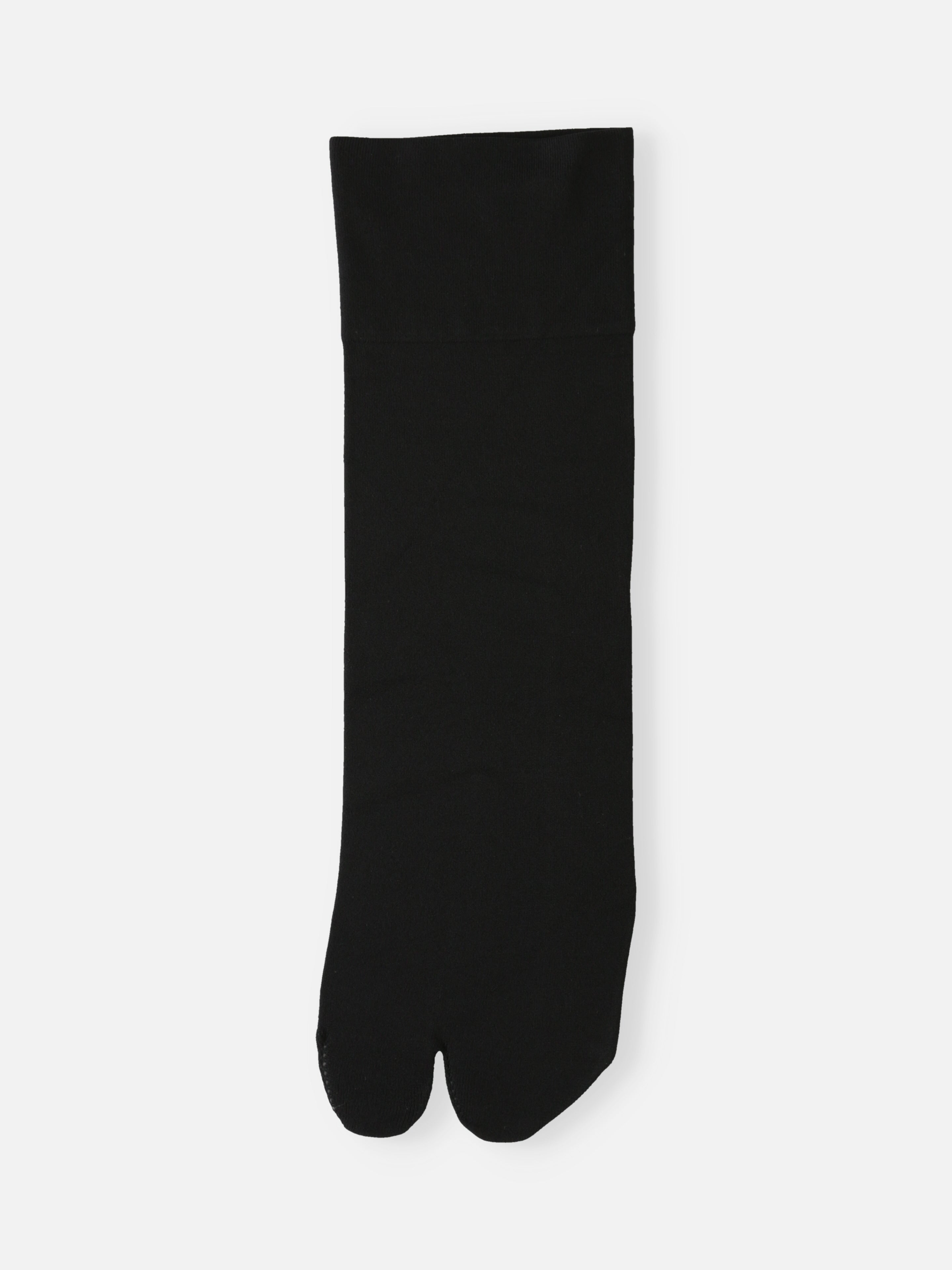 Tabio Soft Nylon Low Crew Tabi Socks in black, flat front view. Stretchy knit with deodorant-treated nylon.