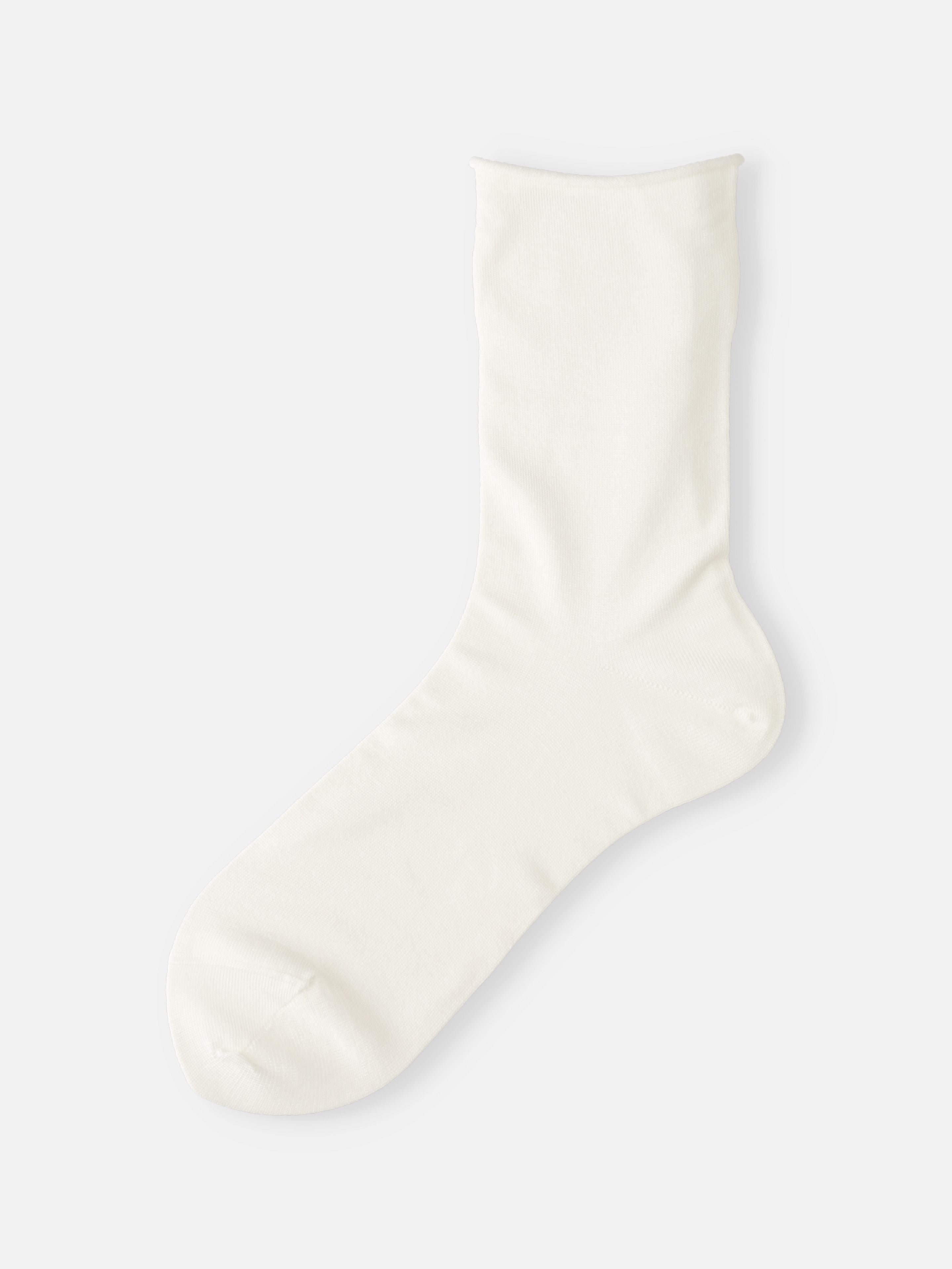 Tabio Premium Silk Plain Soft Low Crew Socks in soft white, showcasing a seamless design and luxurious silk texture.