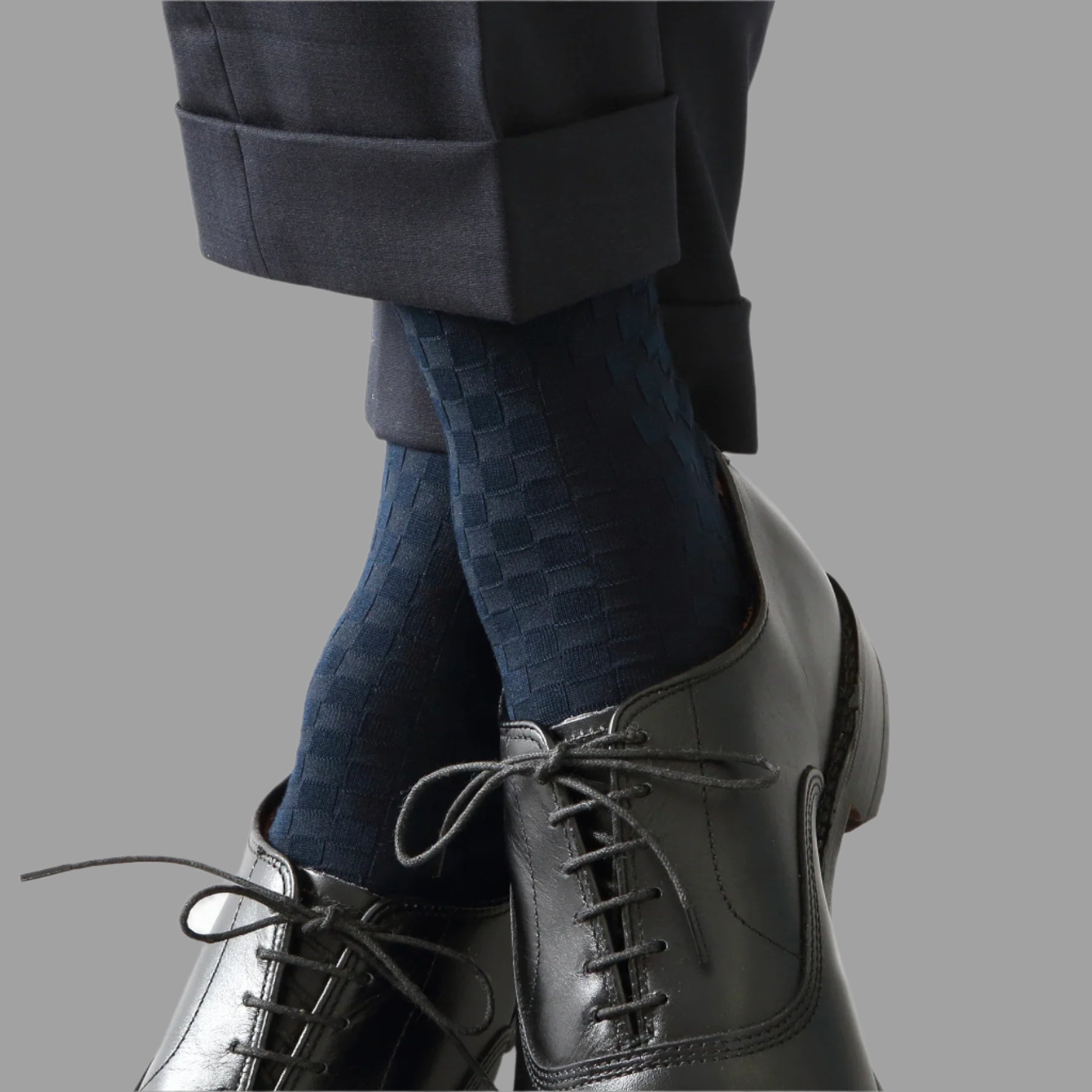 Tabio Damier Pattern Mid-Calf Socks showcased in navy, featuring a stylish textured design, perfect for business attire.