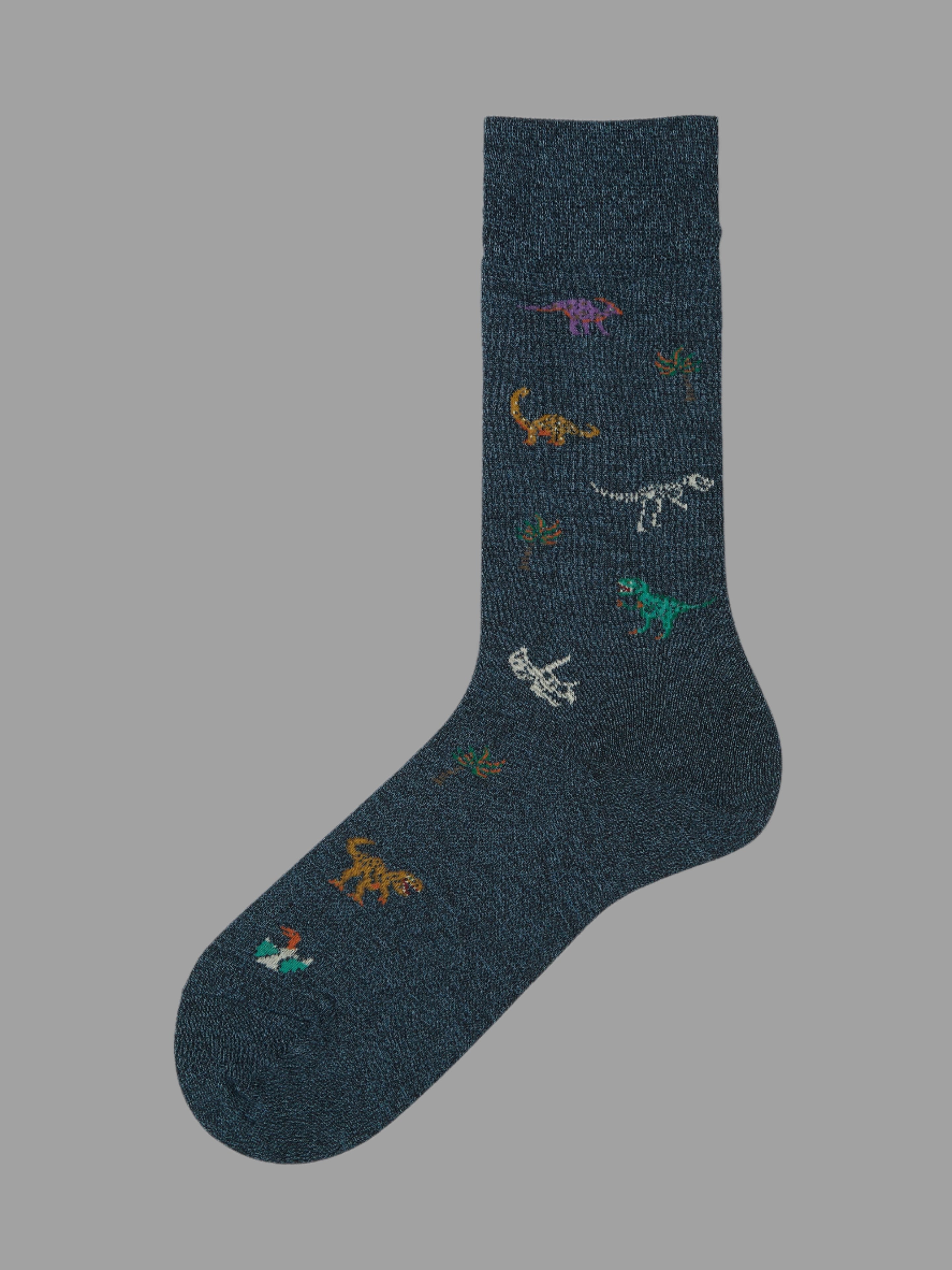 Tabio Dinosaur-Pattern Crew Socks, navy close-up showing colorful dinosaur motifs on premium cotton.