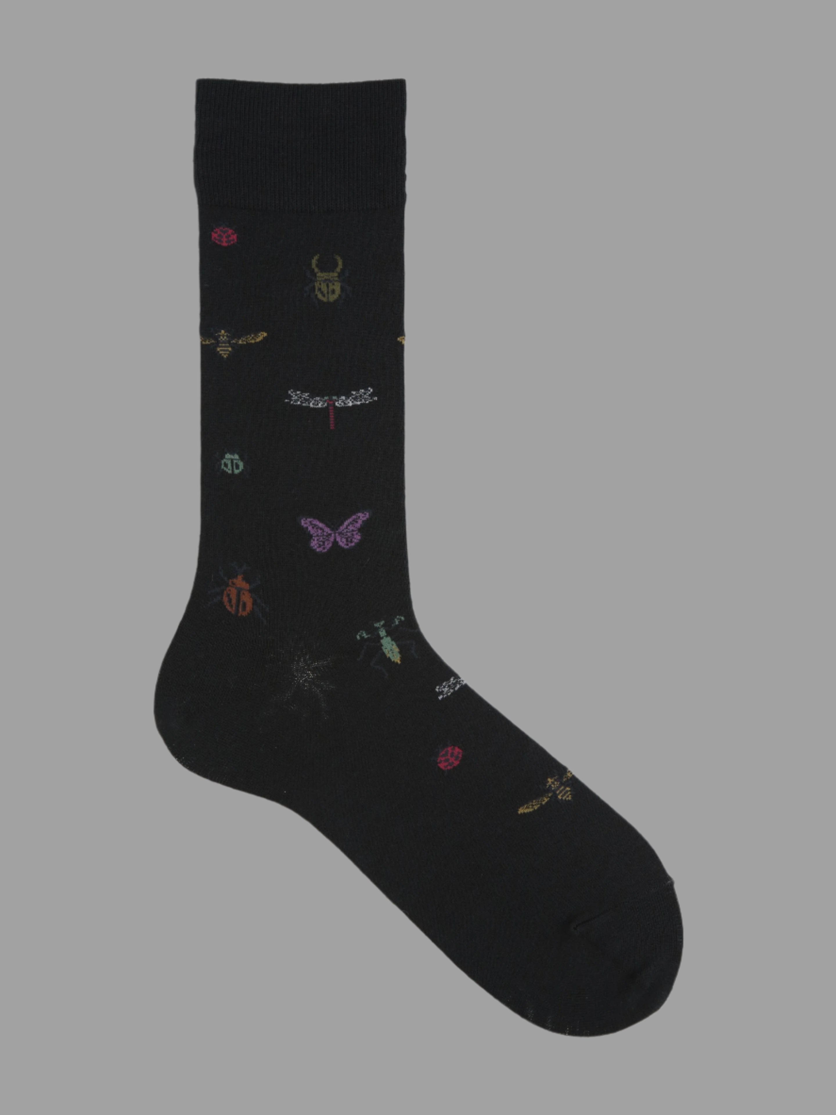 Tabio Dragonfly-Pattern Crew Socks with nature motifs on black, side view showing intricate insect designs.