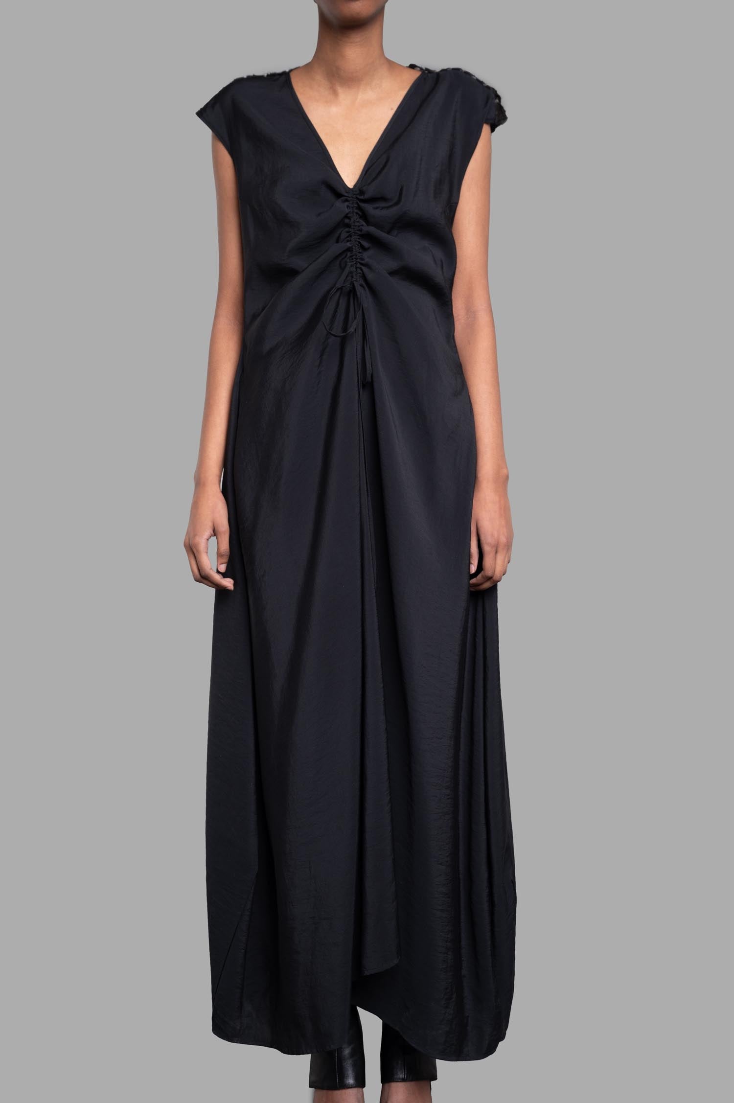 Gentry Portofino Gathered Dress in black, featuring cap sleeves, V-neck, and gathered detailing, displayed on model.