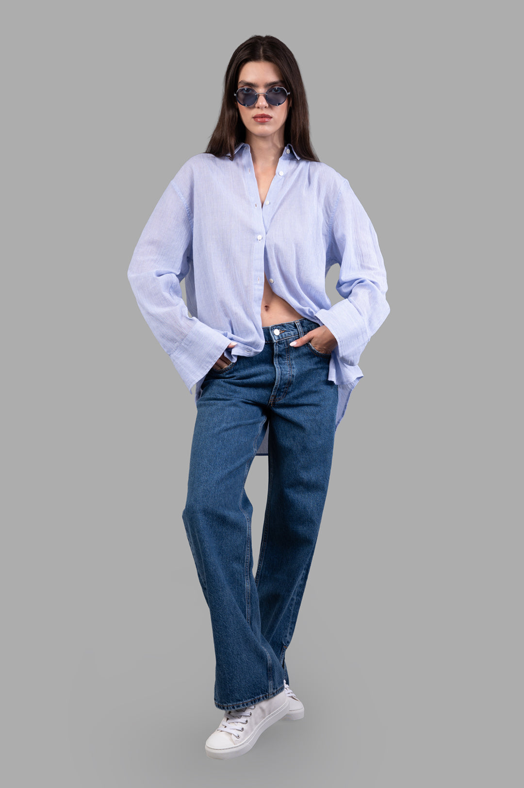Anine Bing Striped Plaza Shirt in blue and white, front view on model, lightweight cotton with button-up style.