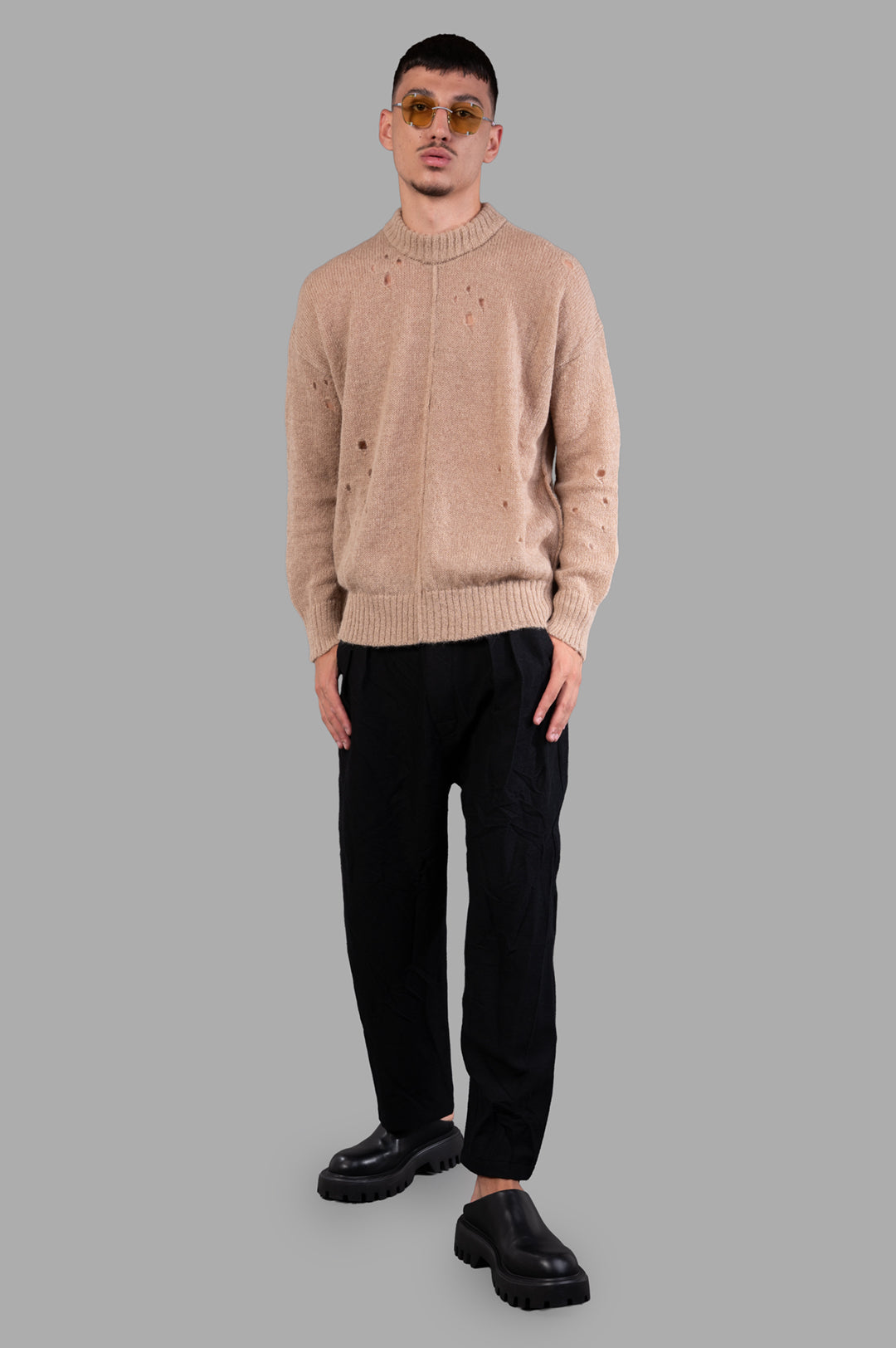 Marc Point Wool Trousers, high-waisted black, front on-model, tailored fit with pleats and modern cropped design.