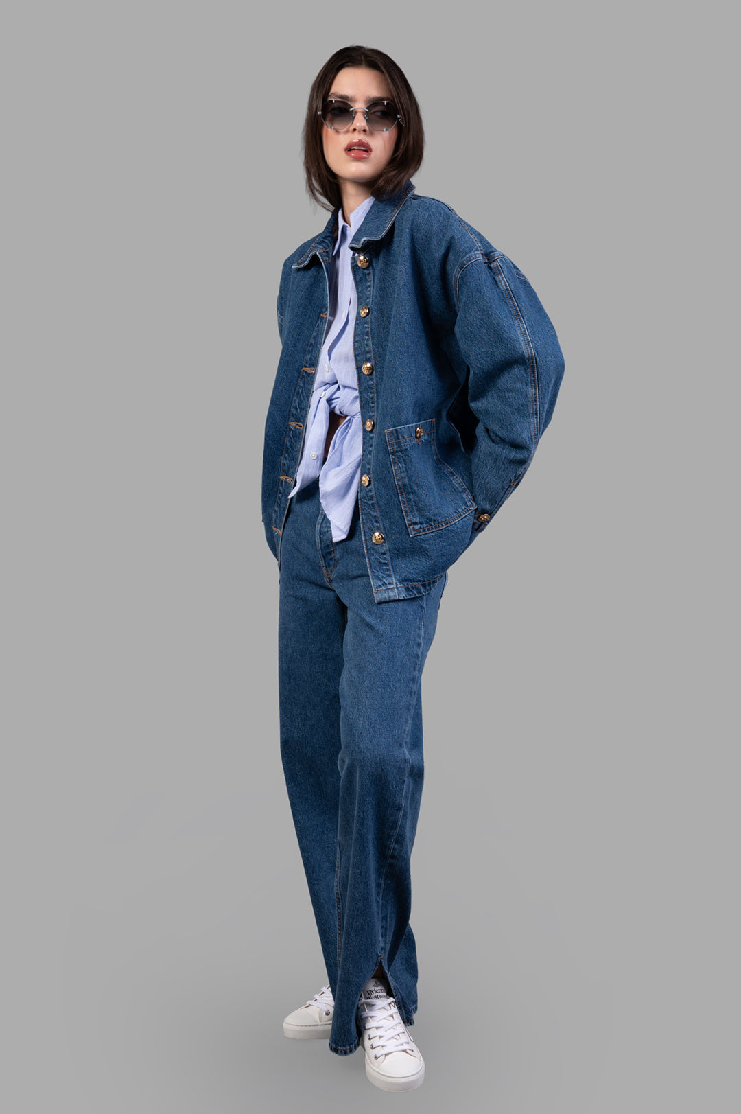 Anine Bing Luca Jacket in blue denim, front view on model, showcasing utility-inspired style with button details.