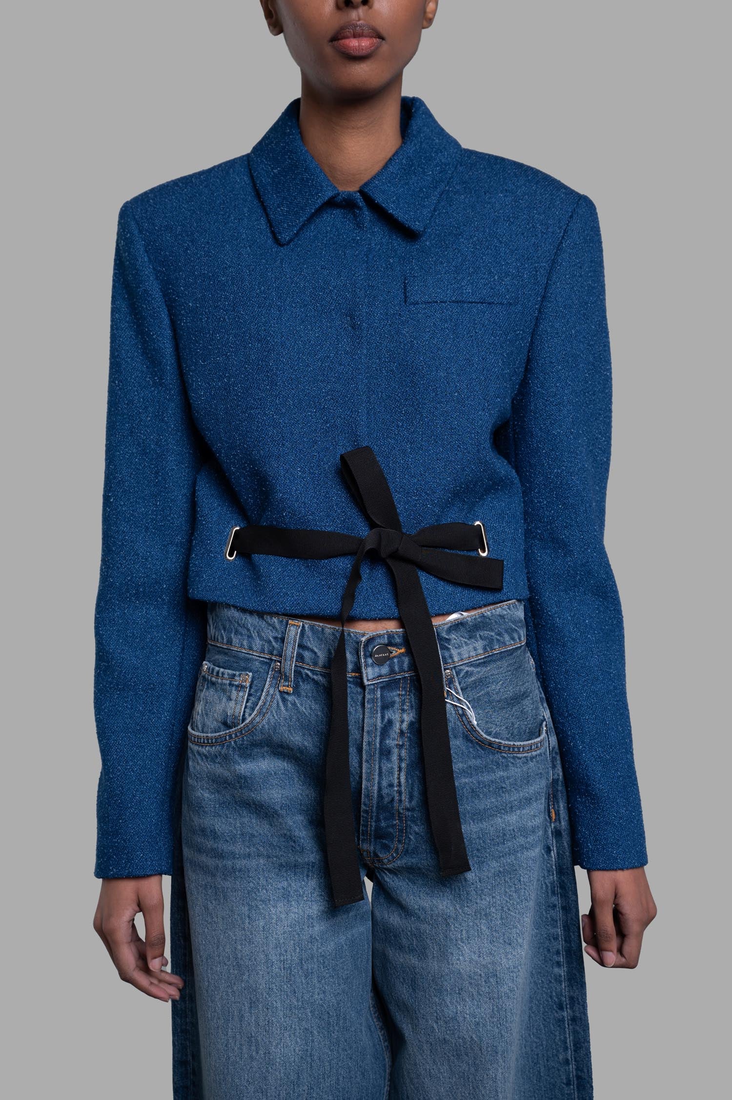 MSGM Cropped Drawstring Blazer in blue featuring a classic collar and customizable waist tie for a chic look.