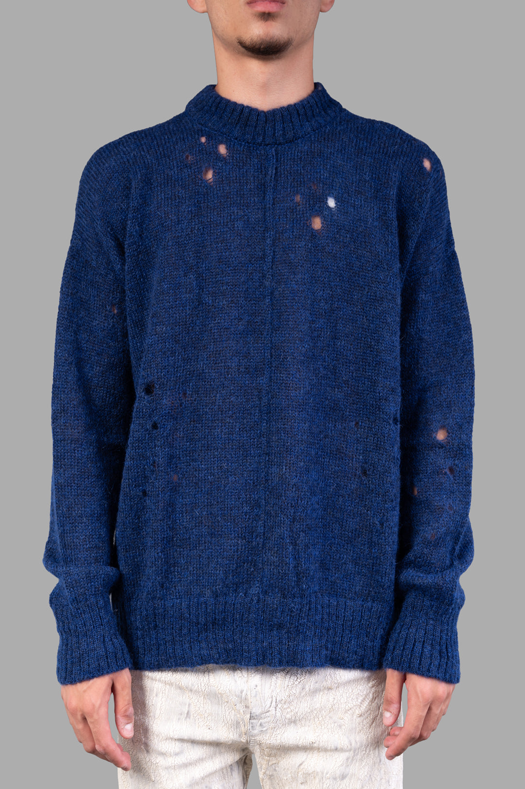 Marc Point Blue Sweater featuring distressed details, showcased on-model, highlighting its unique texture and style.