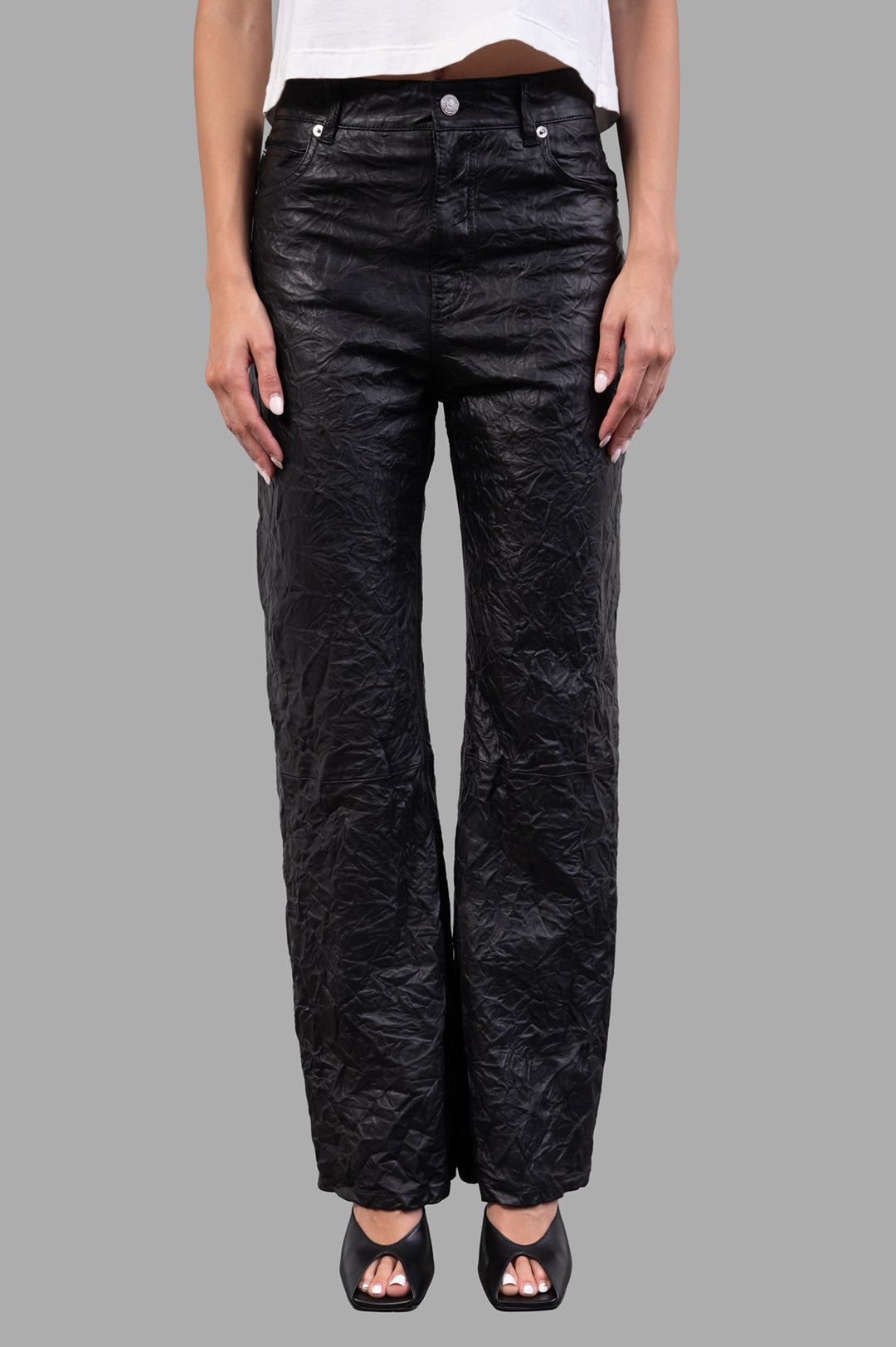 Zadig & Voltaire Evy Leather Trousers in black crinkled leather, featuring a flattering fit and front zipper closure.