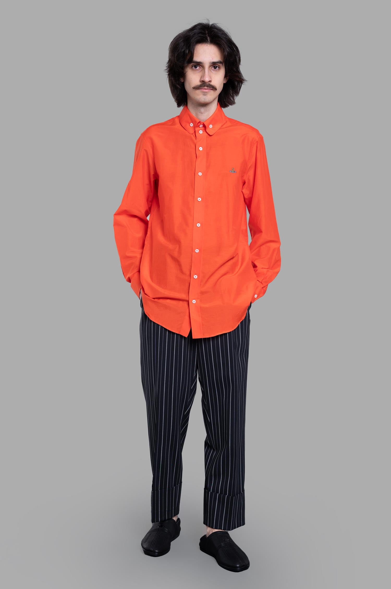 Vivienne Westwood Two-Button Krall Shirt in orange, front view on model, featuring iconic collar and multi-colored orb.