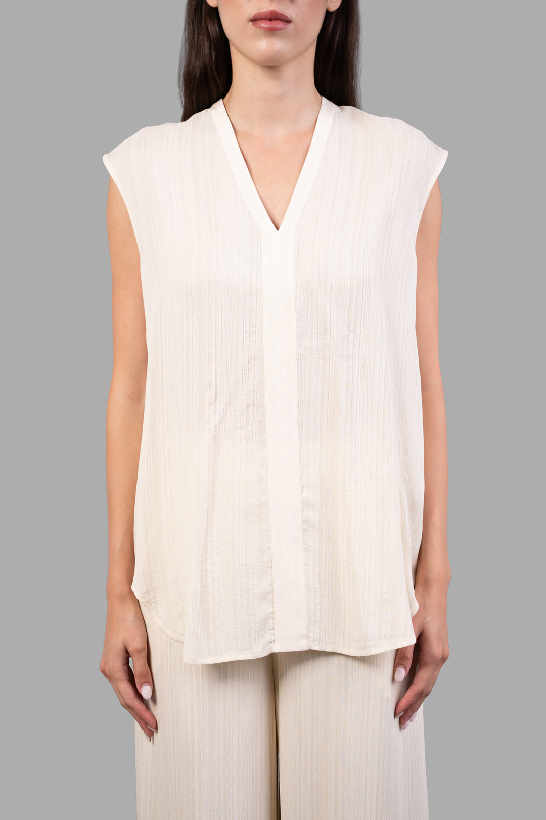 Joseph. Lucien Pleat Jacquard Blouse, sleeveless, lightweight viscose top with linear texture, shown on model from the front.