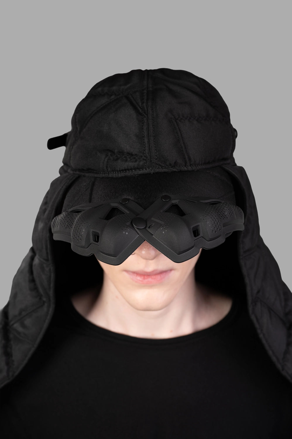 Innerraum Puffer Scarf Cap with Quilted Veil worn by model, showcasing the quilted texture and unique design details.