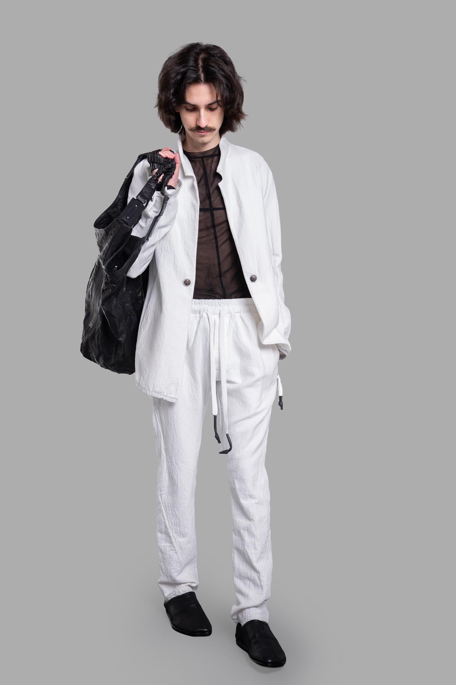 Isaac Sellam Crinkled Blazer, front view; white, organic cotton with unique collar, worn on model, stylish and bold design.