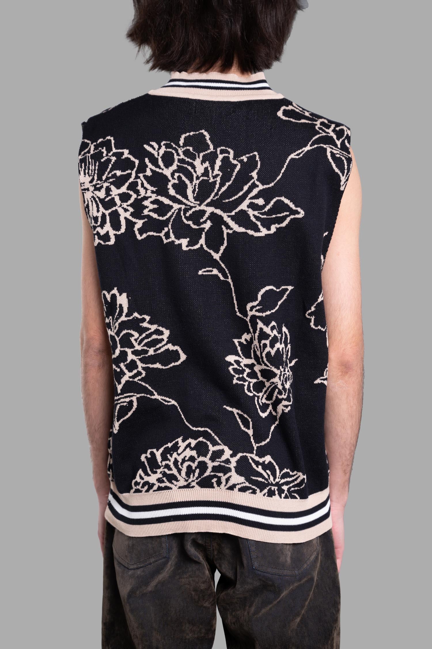 Gaëlle Paris Floral Vest showcasing a floral print on a sleeveless design, viewed from the back with striped detailing.