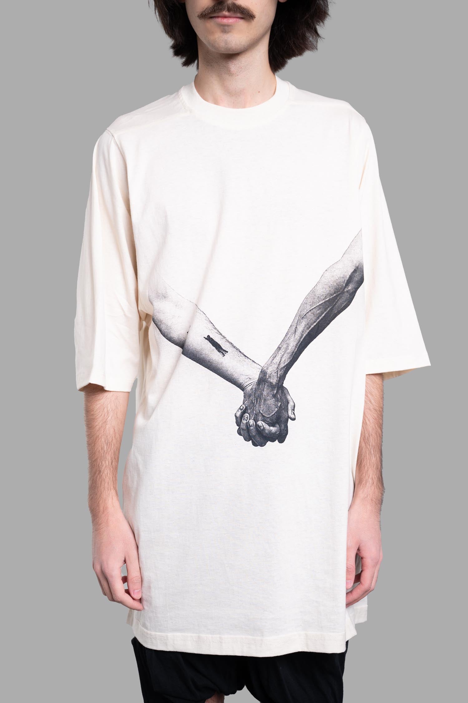 Rick Owens Jumbo T-shirt in ecru features a striking hands graphic on the front, showcasing a relaxed fit and soft cotton.