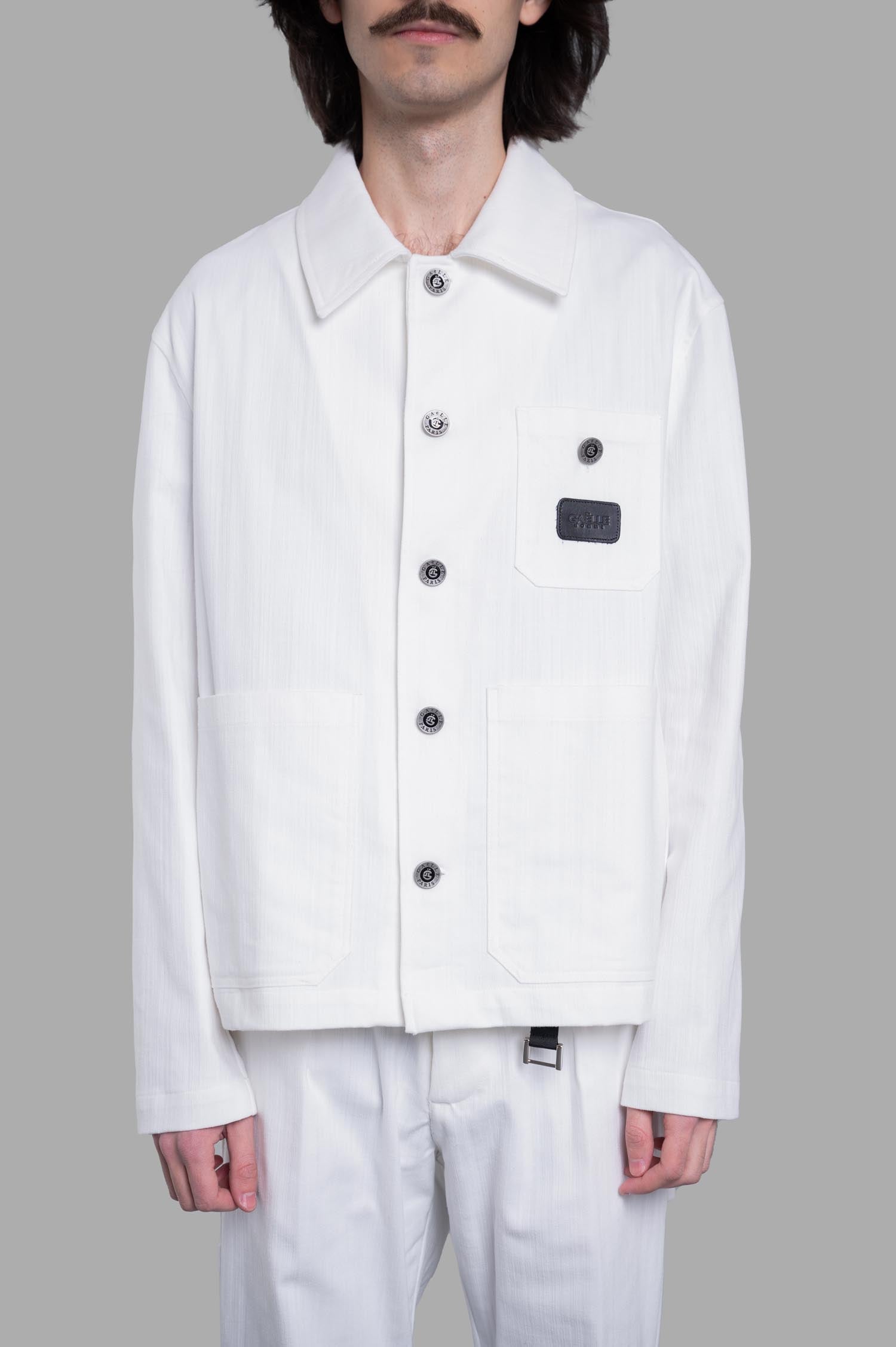 Gaëlle Paris Button-up Jacket displayed on-model, featuring front view, detailed buttons, and functional chest pocket.