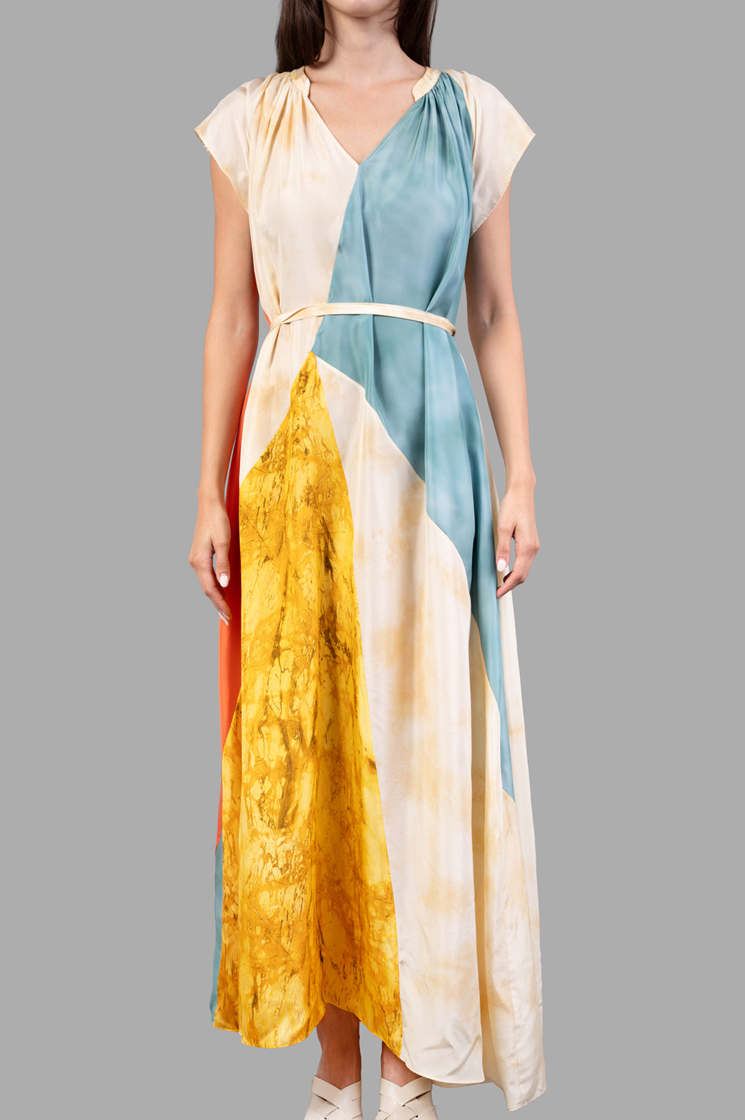 Joseph Silk Tulipa Maxi Dress in habotai silk, featuring a geometric print and gathered neckline, shown on model.