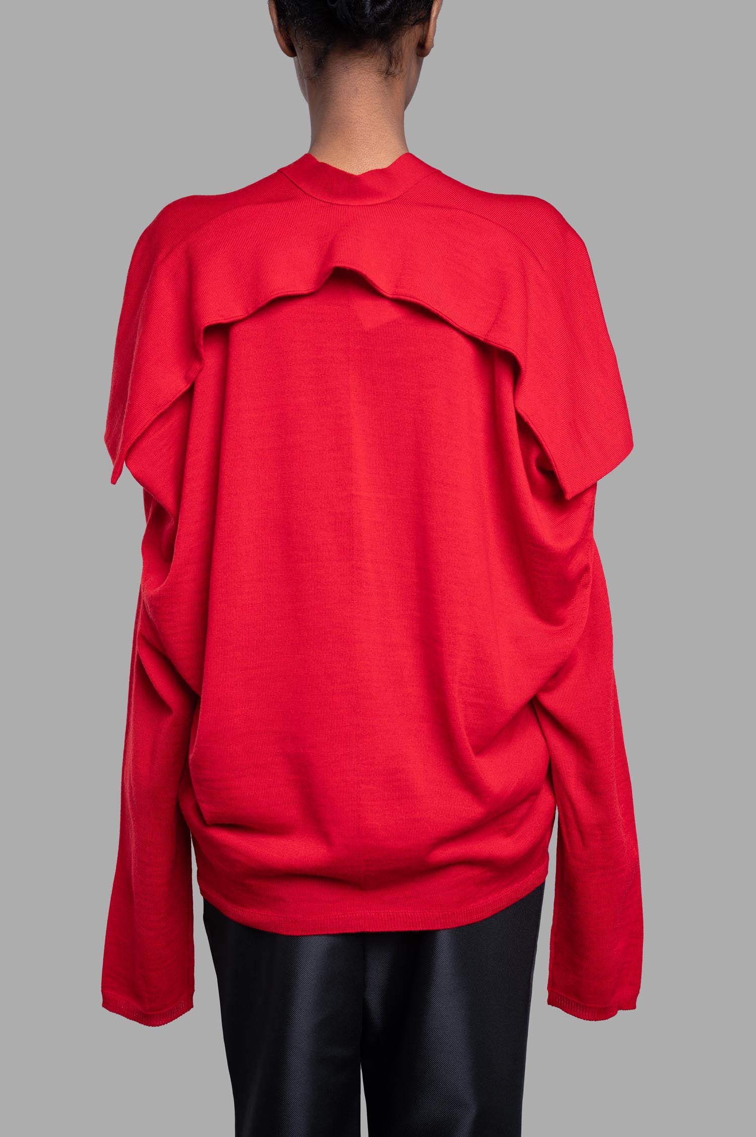 Comme des Garçons Oversized Fine-knit Cardigan, back view showcases ruffled detail in vibrant red wool knit.
