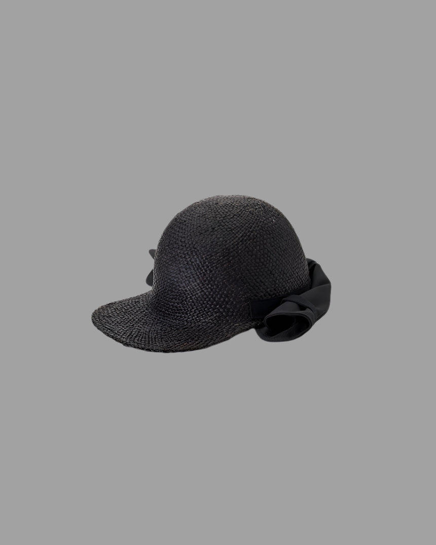 Kijima Takayuki black Straw Sun Hat side view, featuring raffia craftsmanship and modern design with a sleek ribbon detail.