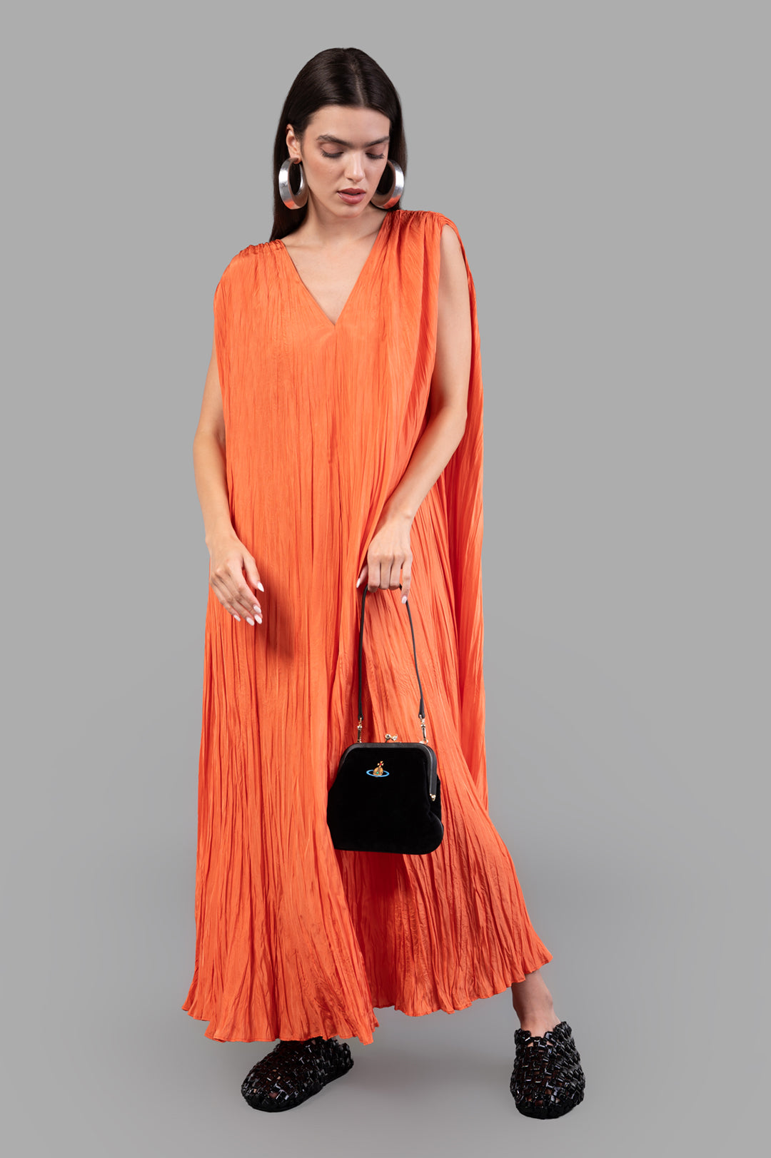 Joseph Habotai Silk Dress in orange, front view on model, showcasing crinkled texture and relaxed fit with tie belt.