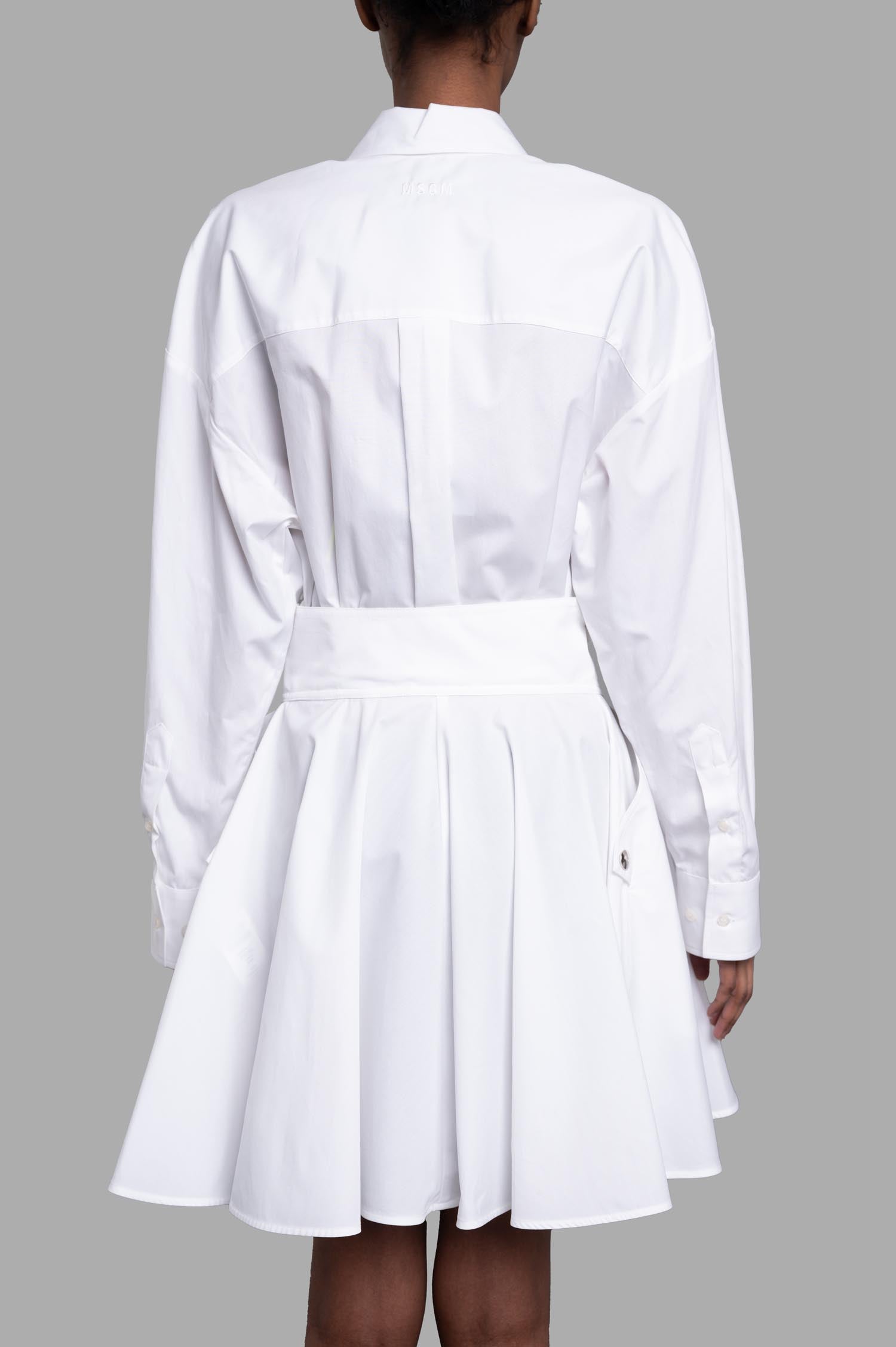MSGM Tennis Dress featuring pleated A-line skirt, classic collar, and cinched waist, shown from the back in white cotton.
