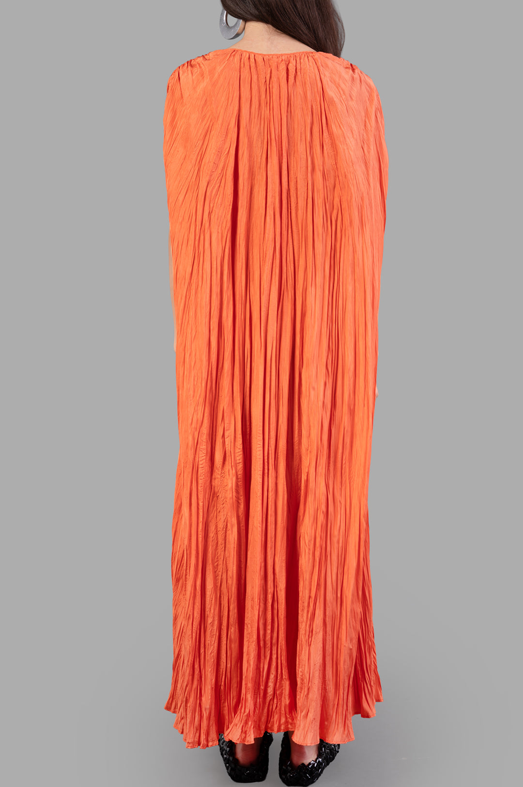 Joseph Habotai Silk Dress showcasing a vibrant orange crinkled texture from the back, featuring a relaxed fit and tie belt.