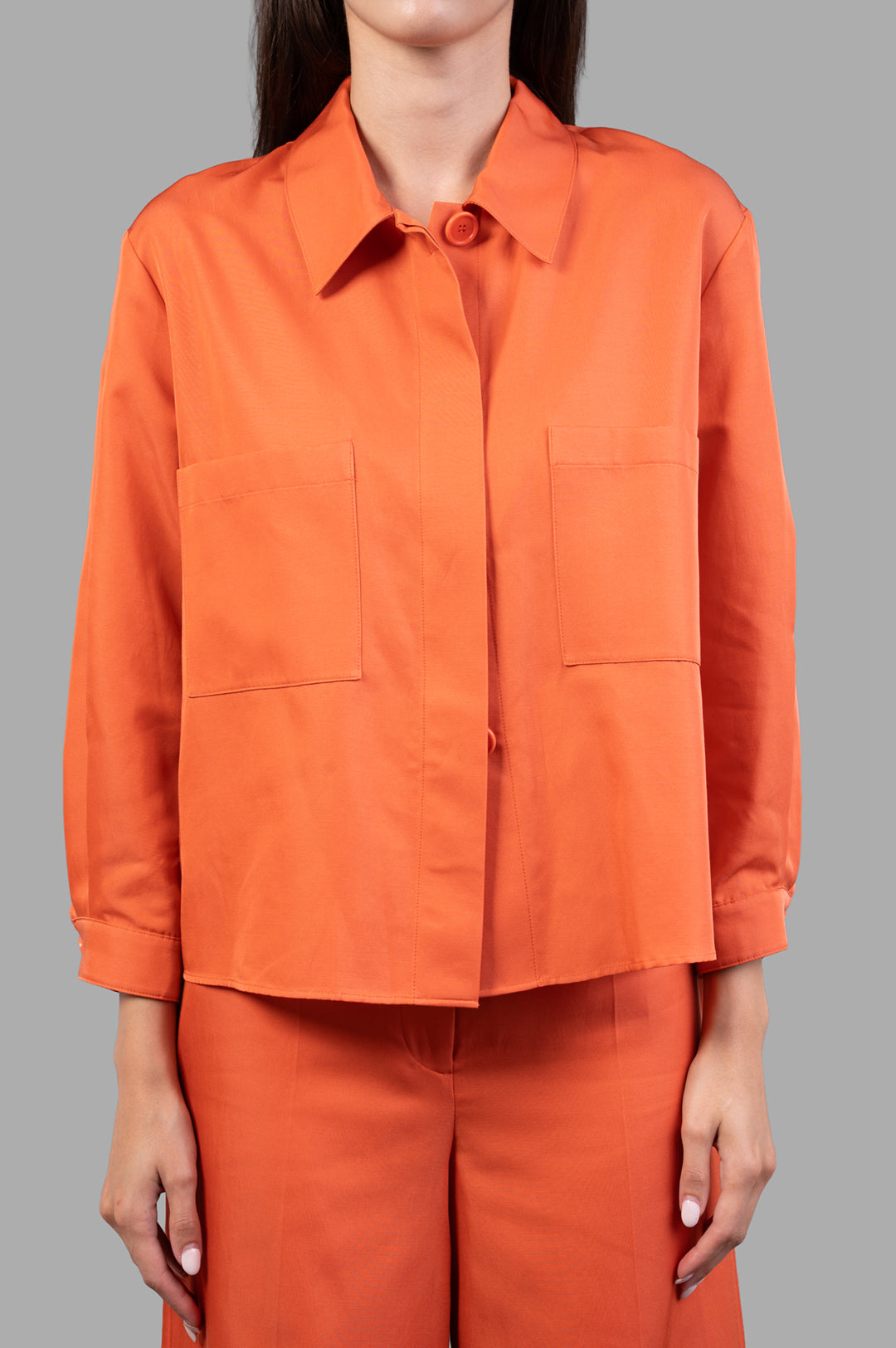 Joseph Soft Cotton Silk Shirt in burnt orange, featuring a boxy silhouette, cropped length, and two front patch pockets.