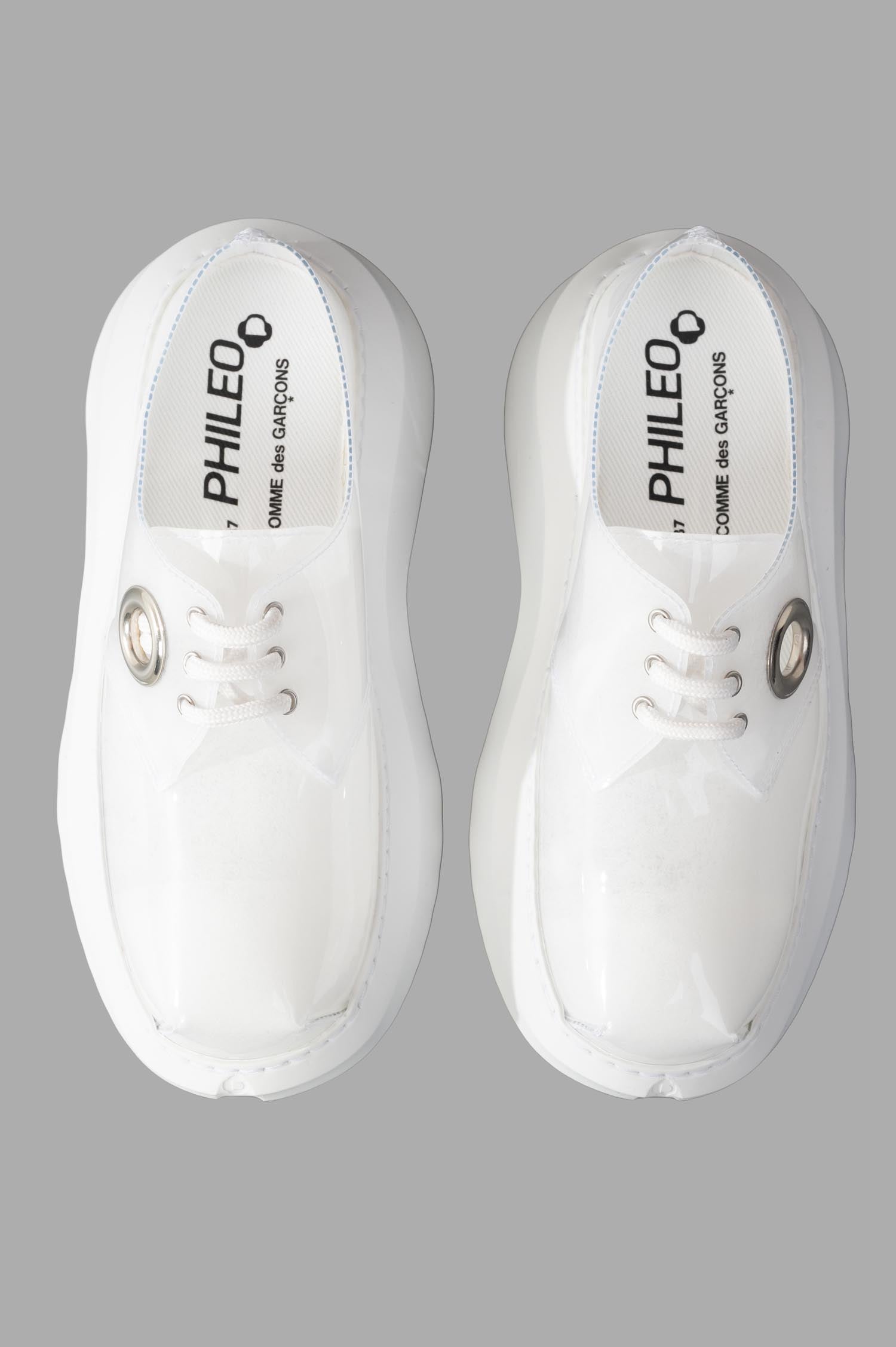 Comme des Garçons x Phileo 062 Derby Shoes, white rubber upper with silver eyelet and lacing, top view showcasing design.
