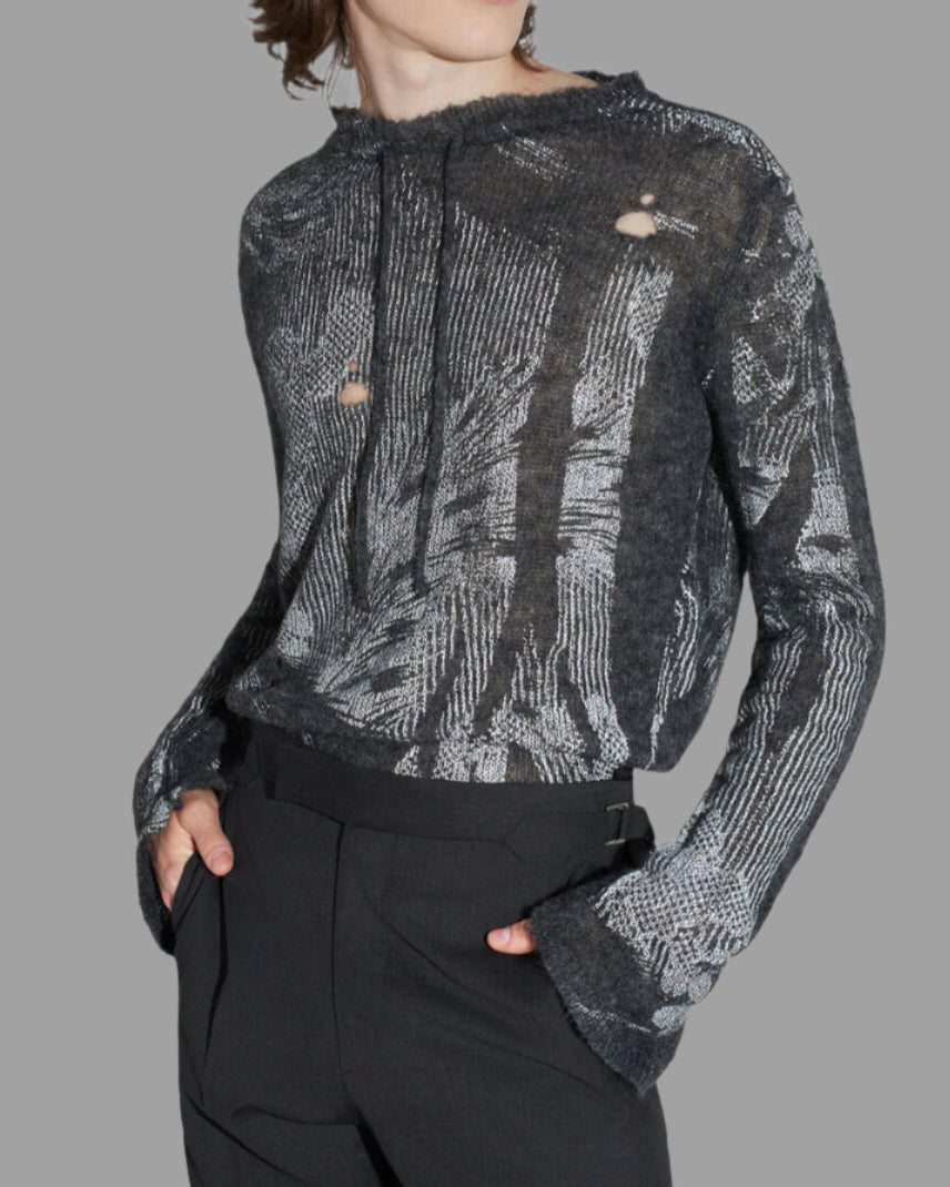 Vivienne Westwood. Hi-Vis Jumper in grey, featuring long sleeves, raw edges, and unique openings, shown on model.