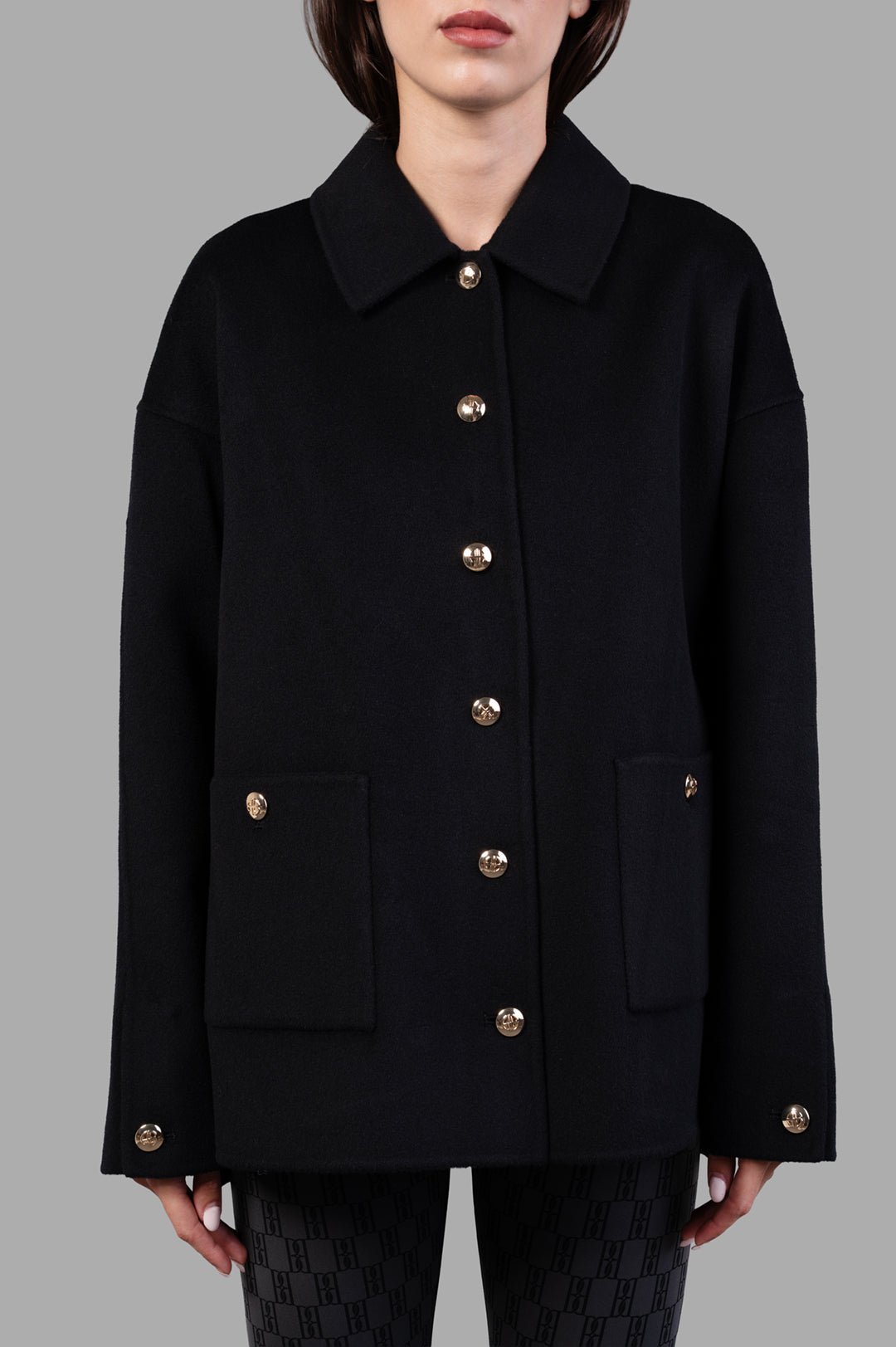 Anine Bing Luca Jacket in Black Cashmere, front view showcasing gold buttons and utility-inspired design details.