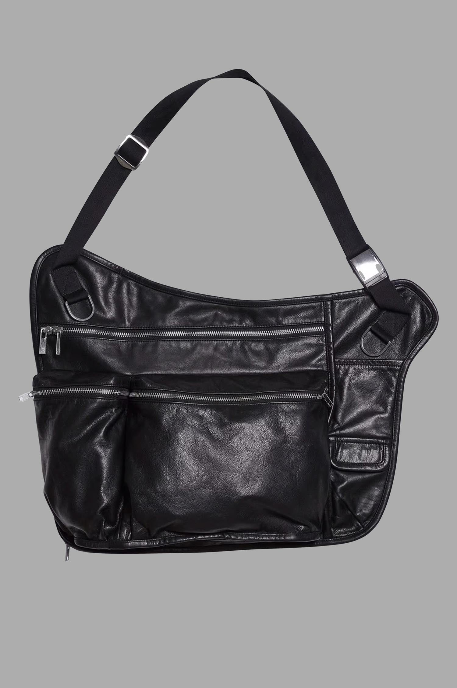Helmut Lang Utility Bag Vest in black leather, highlighting a side view with distinct utility pockets and unique strap.