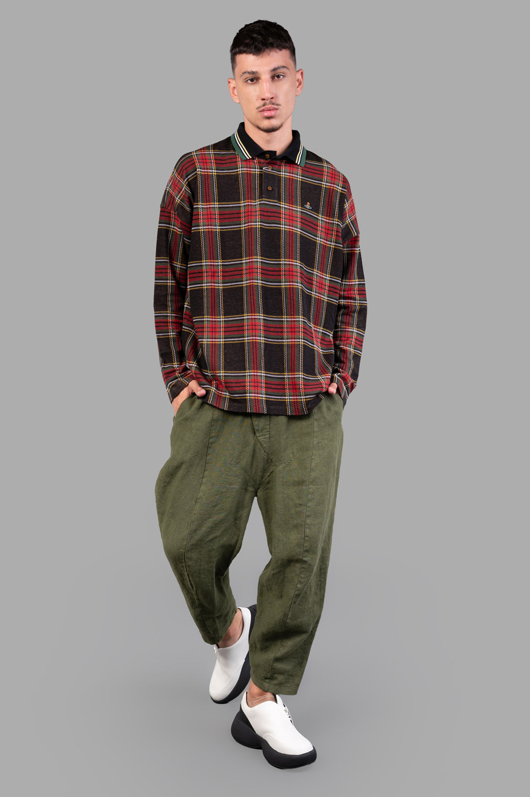 Vivienne Westwood Long-Sleeve Tartan Polo Shirt, dark red pattern, model front view, button fastening, 100% cotton.