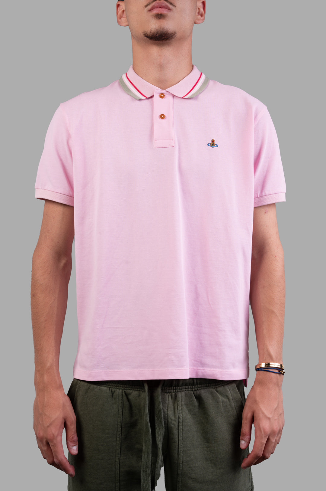 Vivienne Westwood Classic Logo Polo Shirt in pink, featuring iconic orb embroidery and striped detailing at the collar.