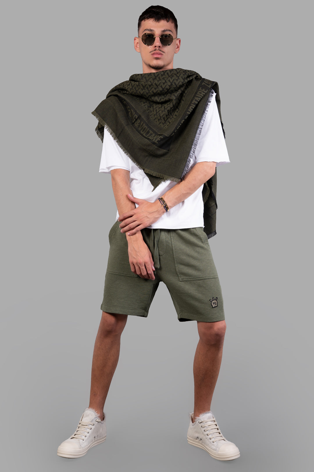 Zadig & Voltaire khaki Pablo Slub Shorts on model, featuring elastic waistband and side pockets, casual street style.