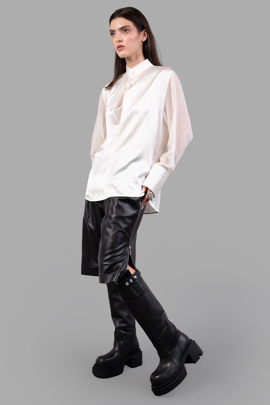 Helmut Lang Relaxed Cowl Shirt in ivory silk, front view on model, featuring sheer chiffon sleeves and draped cowl neckline.