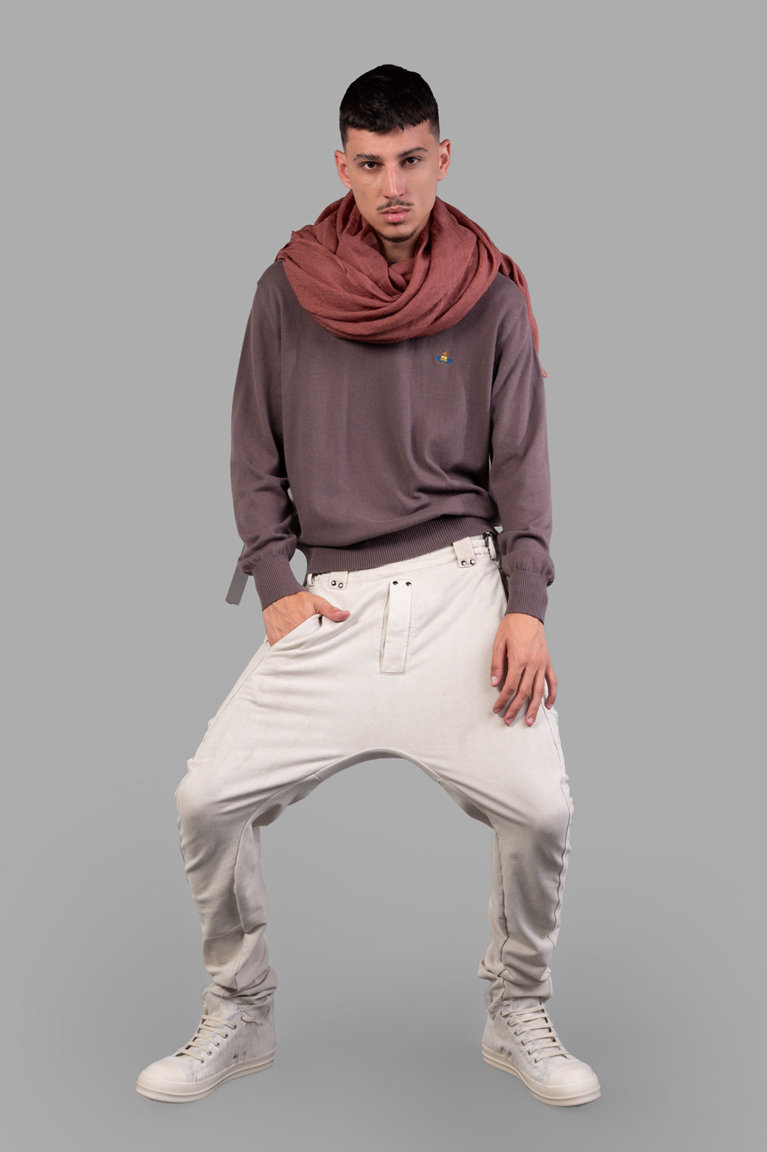 Vivienne Westwood Orb-embroidered Jumper in Truffle on model, showcasing rib-knit details and relaxed fit with a scarf.