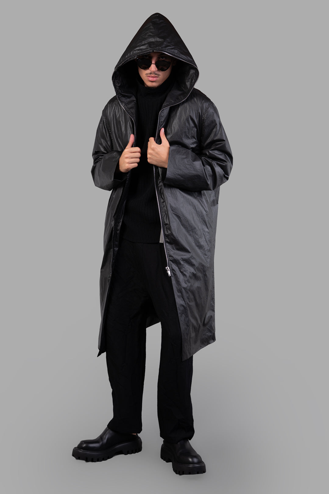 Rick Owens Concordians Gimp Mac in Black, on-model front view, hooded coat, knee-length, large hood, sleek design.