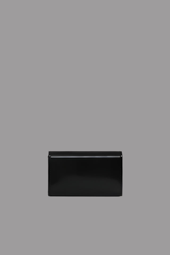 Anine Bing Elly Wallet in high-shine black leather, showcasing sleek design and functional magnetic closure for organization.