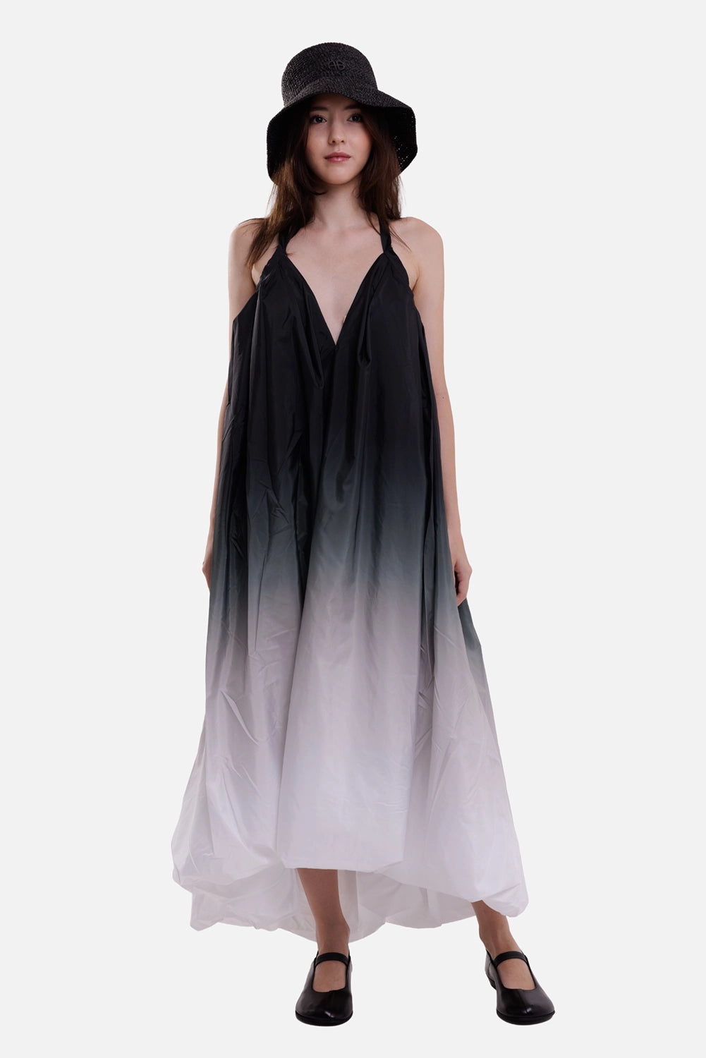 Norma Kamali women's ombre bubble dress in black and white, full-length view with deep V-neck and voluminous hem