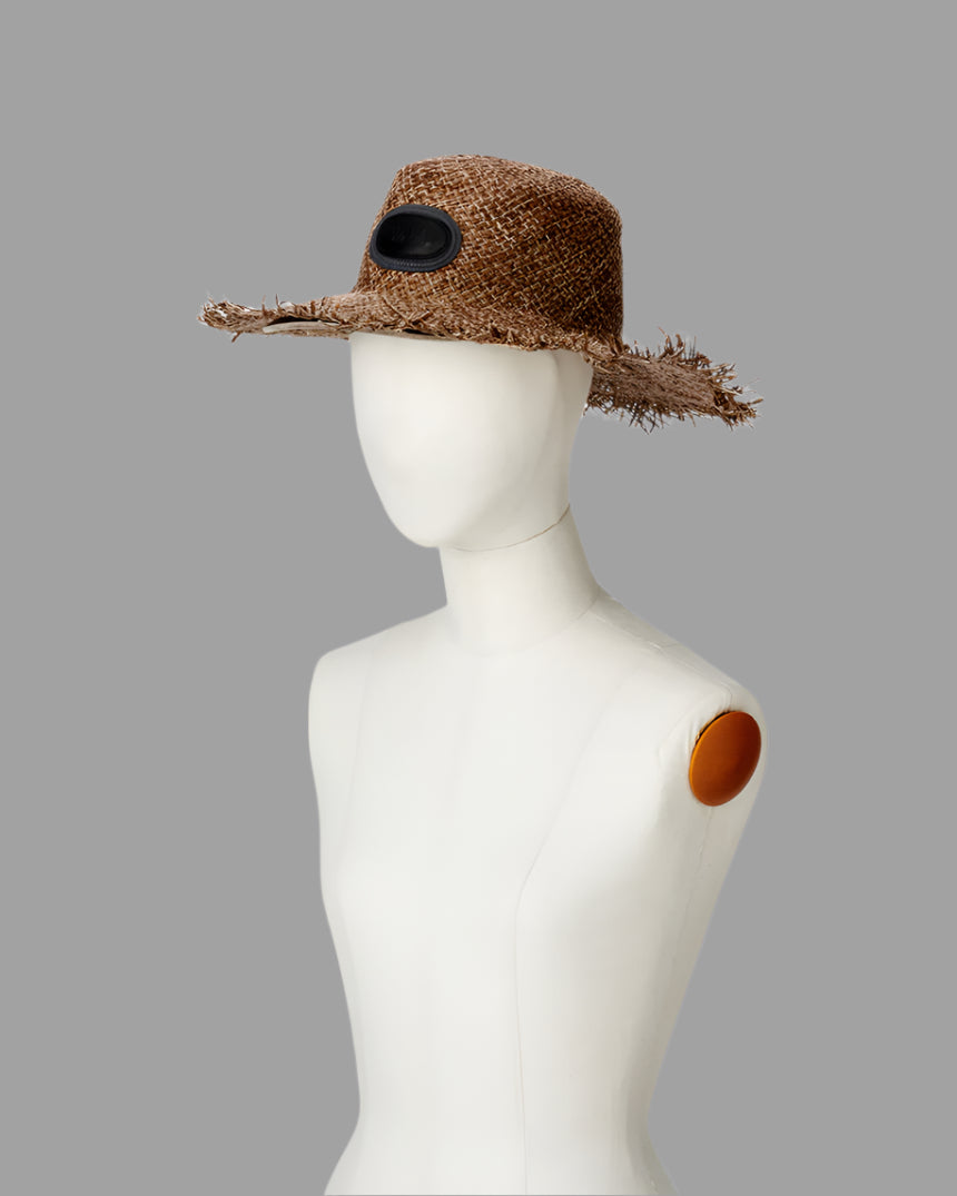 Kijima Takayuki Wide-brim Straw Hat shown on a mannequin, highlighting its intricate raffia texture in brown with unique.