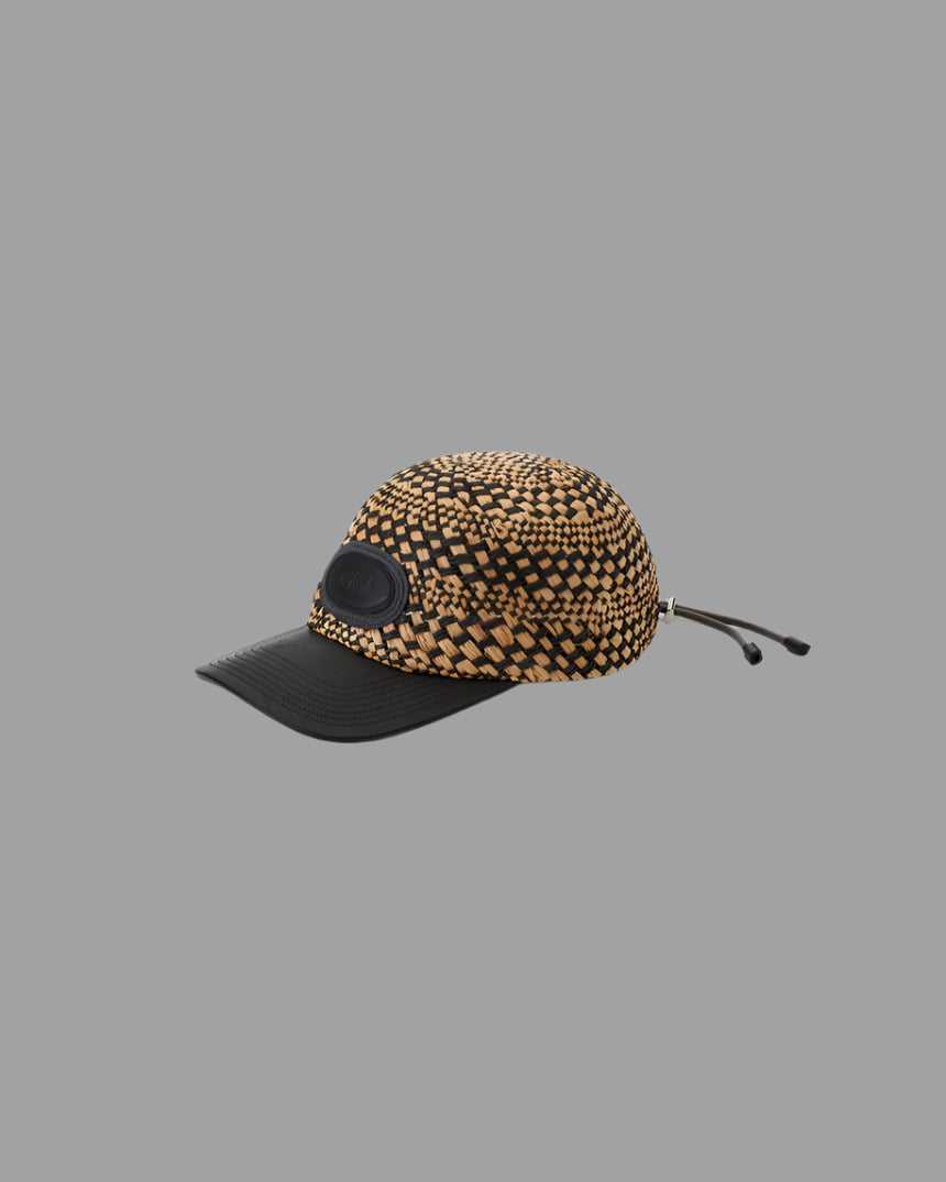 Kijima Takayuki color-block straw hat in black/beige, side view; crafted from raffia and polyester with modern elegance.