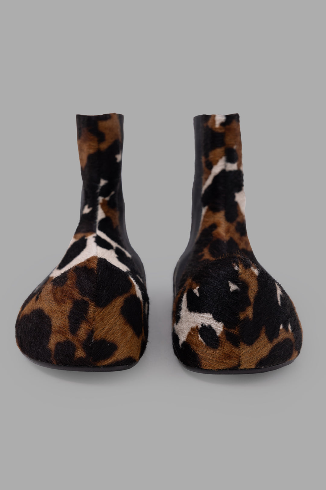 A.W.A.K.E. MODE women's multicolour pony leather ankle boots, front view showing squared sculptural toes.