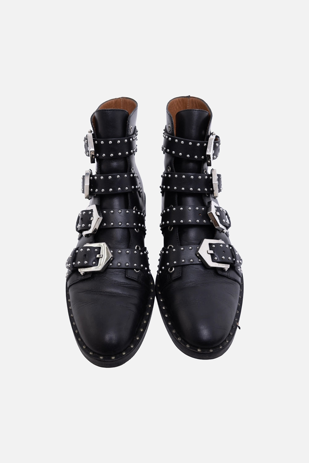 Pre-owned Givenchy ankle boots in black, front view, multi-buckle straps and studded trim