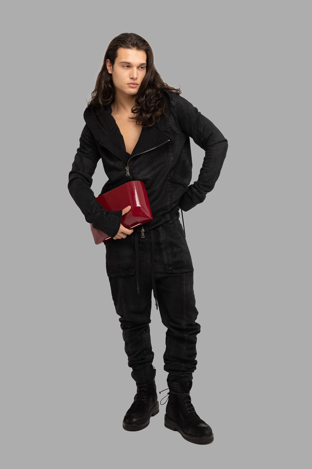 MD75 men’s asymmetric-zip hoodie in black leather effect, on-model full length, oversized hood and coated finish.