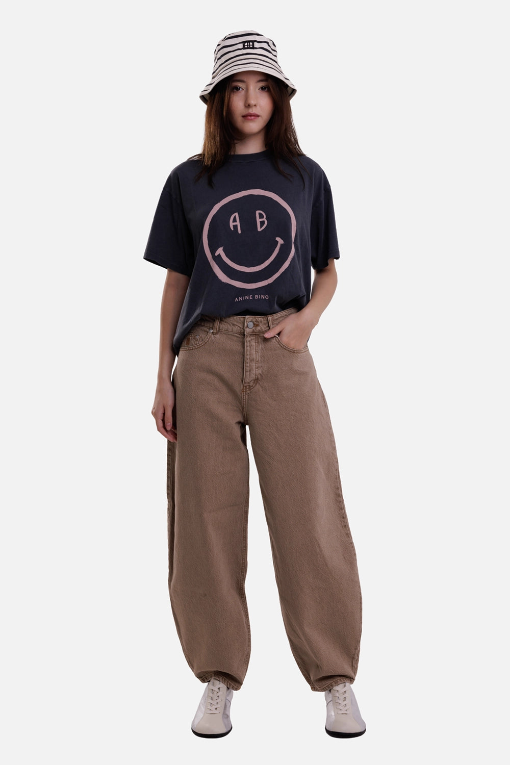 By Malene Birger women's barrel-leg jeans in Toasted Coconut, on-model full-length view with sculpted curved legs