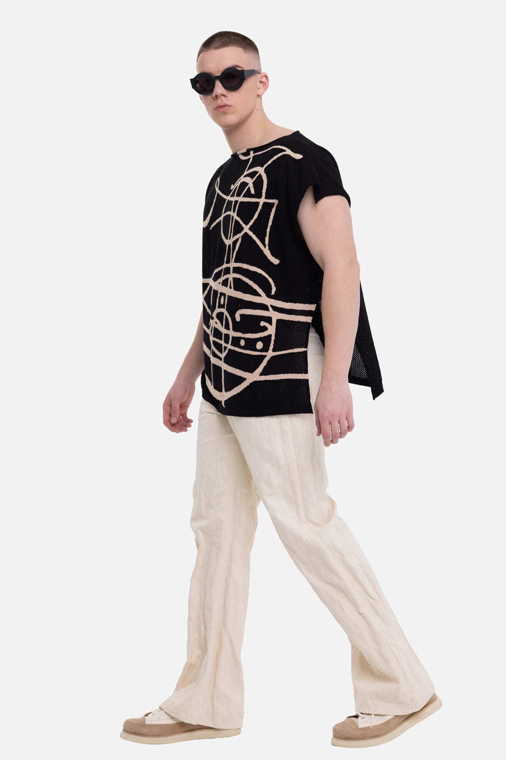 Vivienne Westwood unisex beach top in black, on-model full-length view, draped fit and cap sleeves