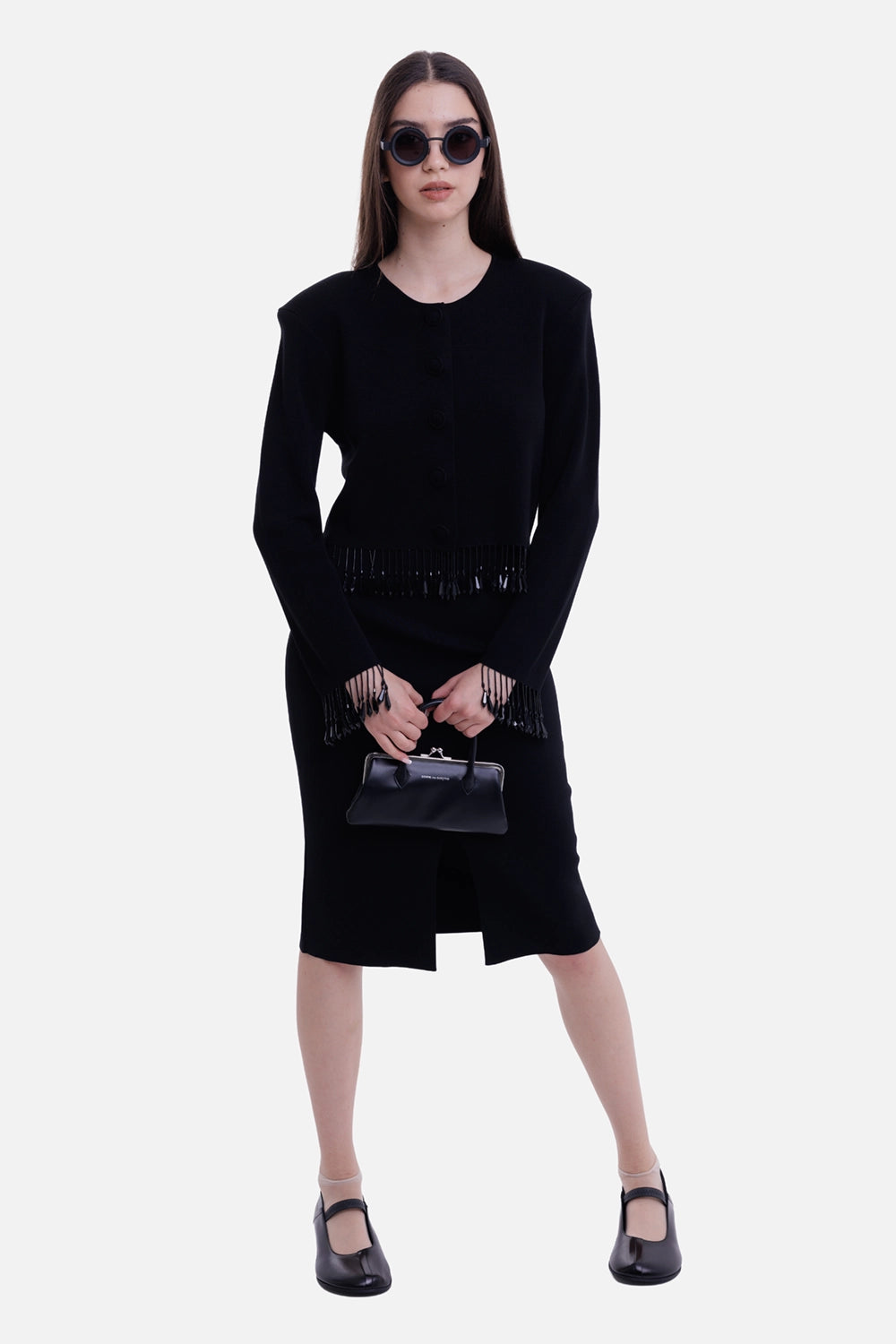 By Malene Birger women's black cardigan, on-model view with cropped fit, shoulder pads and beaded fringe