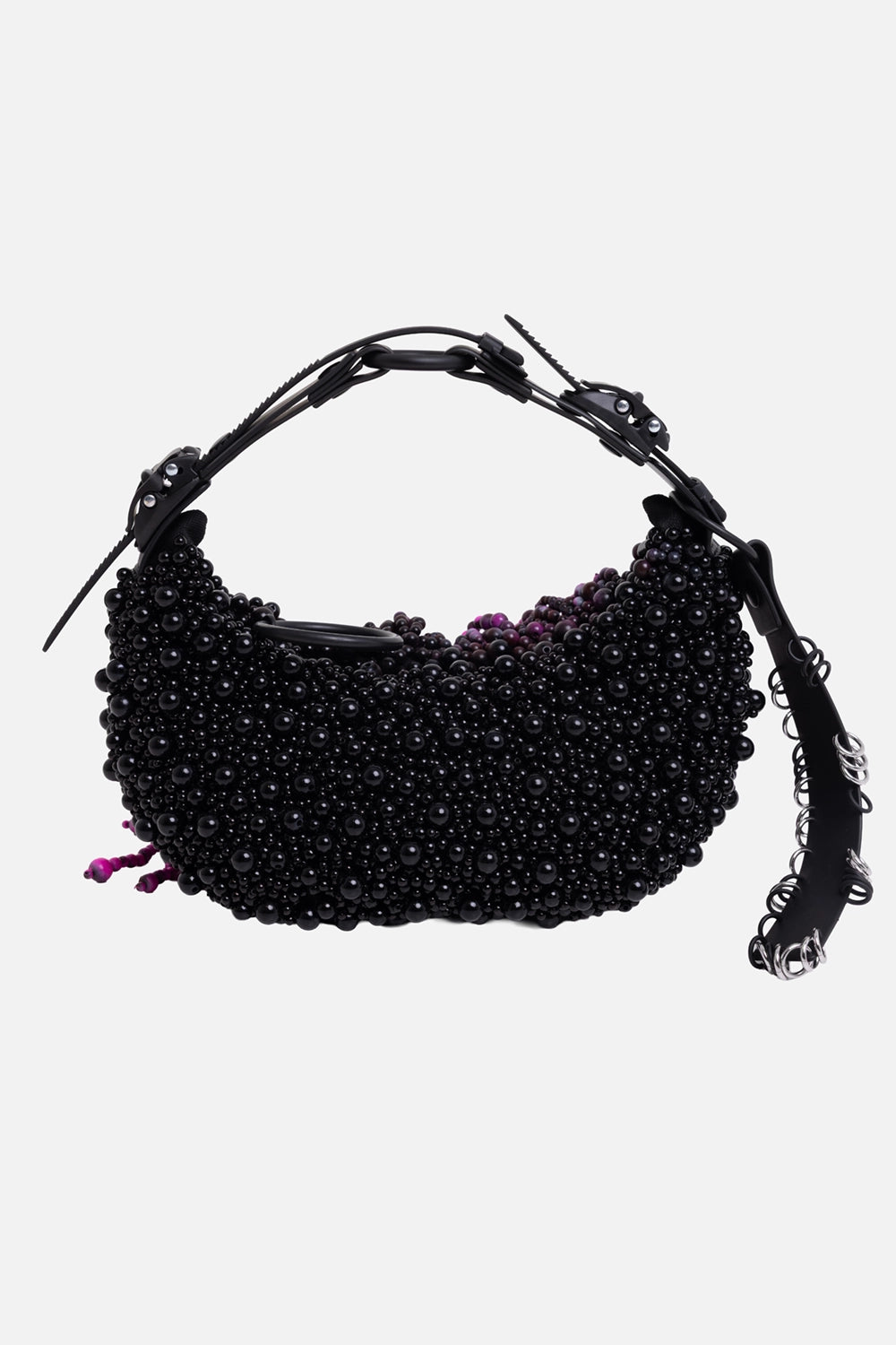 Innerraum unisex beaded half-moon bag in black, back view with black beadwork and coiled rings on strap