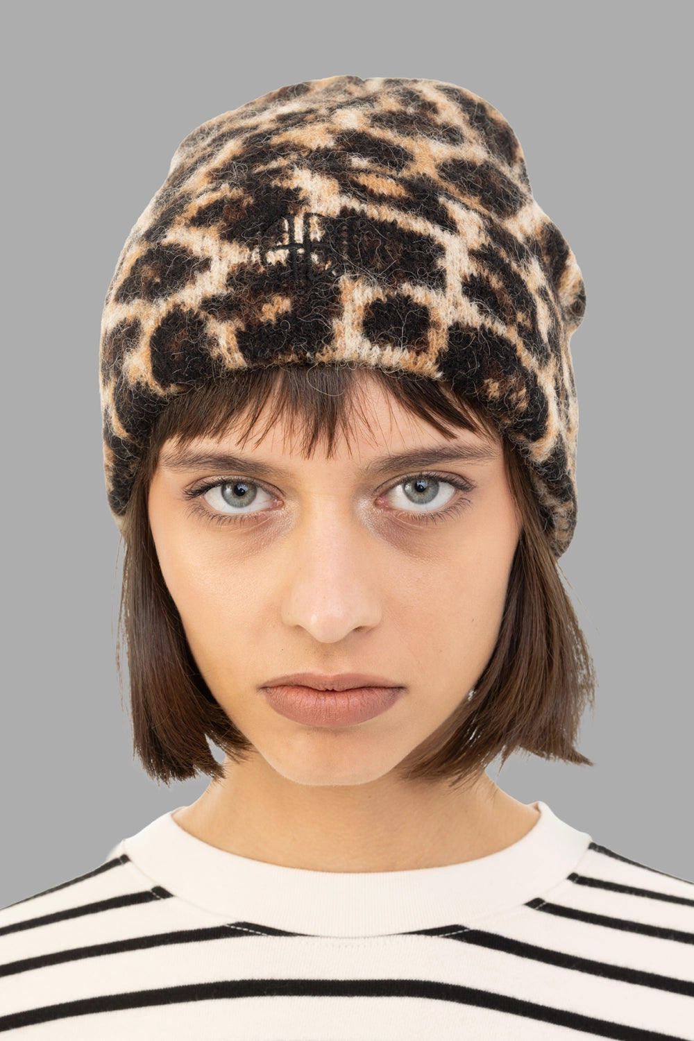 ANINE BING women leopard-print beanie in black and brown, on-model front portrait, folded brim with tonal embroidered logo
